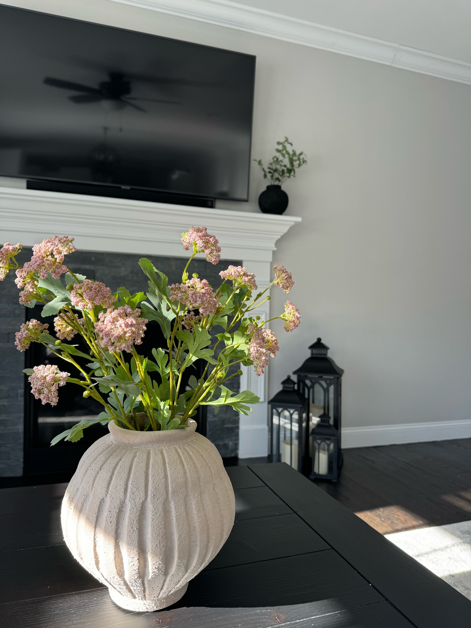 I have bought A LOT of different vases and stems over the years and I have different sizes and colors throughout my house…

I can honestly say this is my favorite new vase and floral combo. The muted pink is the perfect pop of subtle color in the living room.

Another bonus? They’re affordable!

These stems go for $5 each when similar styles are sold for $15+ each…

I used 5 here, but I will probably get 1-2 more to achieve a fuller look with this larger size vase!

#LTKSeasonal #LTKfindsunder50 #LTKhome