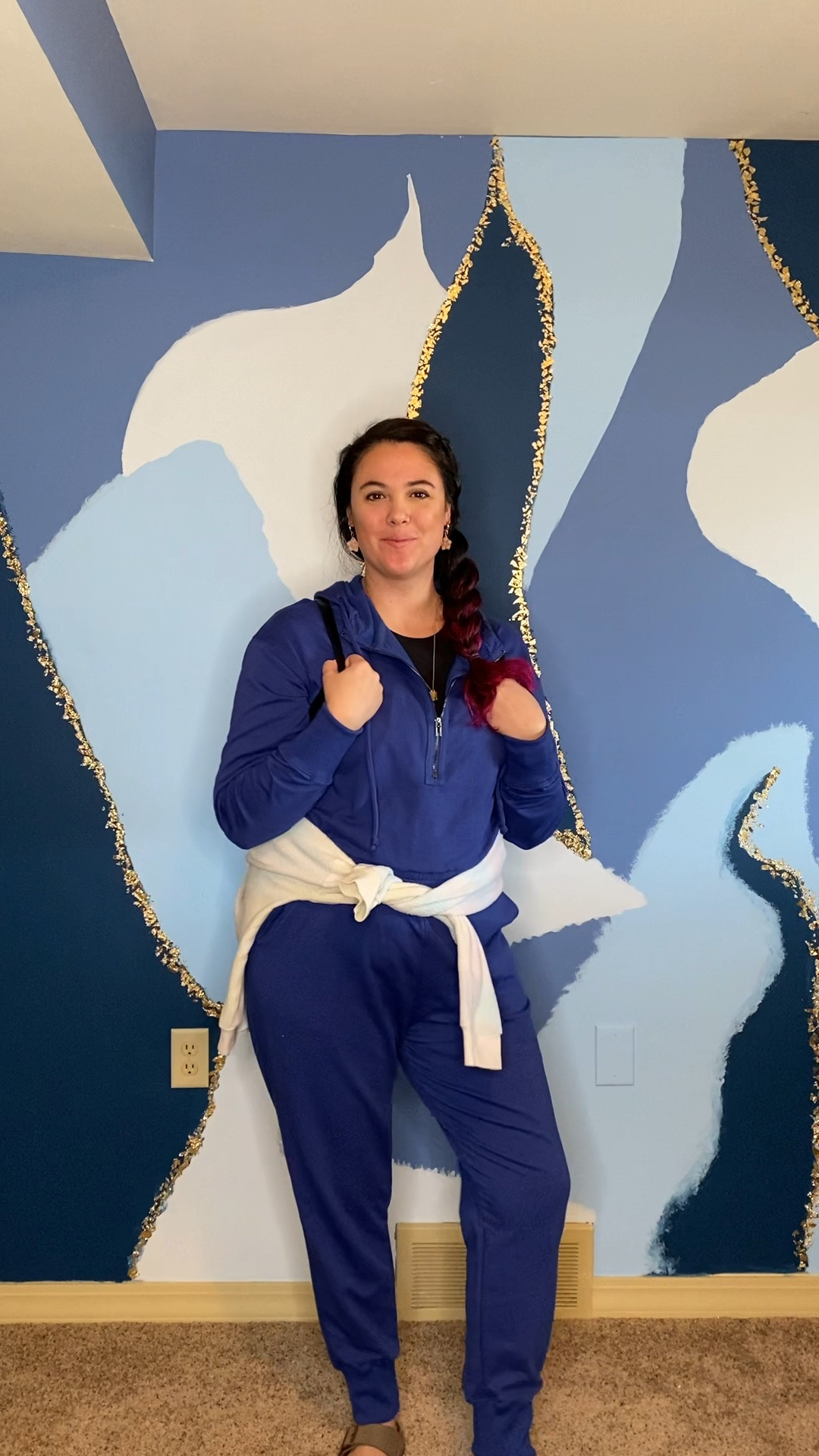 Styling a blue athletic jumpsuit with a sweatshirt, backpack and Birkenstock sandals

#LTKmidsize #LTKfindsunder100 #LTKplussize
