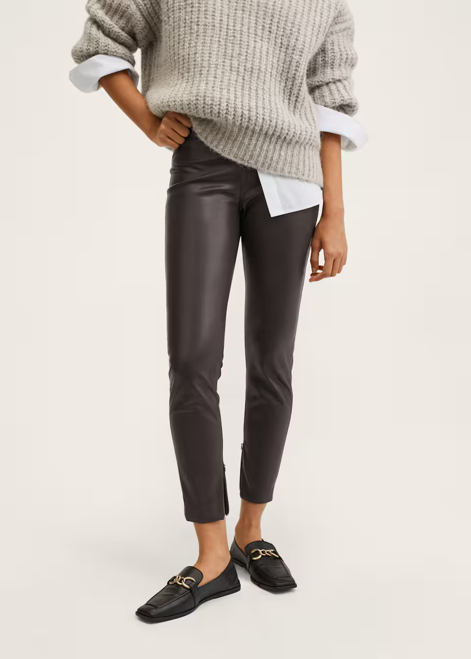 Leather-effect leggings with split hems | MANGO (US)