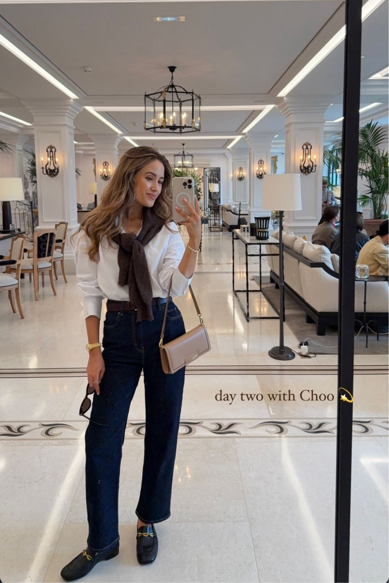 Smart casual look with Jimmy Choo - TALA poplin white shirt is the perfect piece to look effortlessly chic, styled with an Artizia chocolate knit jumper and Weekend Max Mara dark blue jeans. Jimmy Choo accessories 

#LTKbag #LTKstyletip #LTKautumn