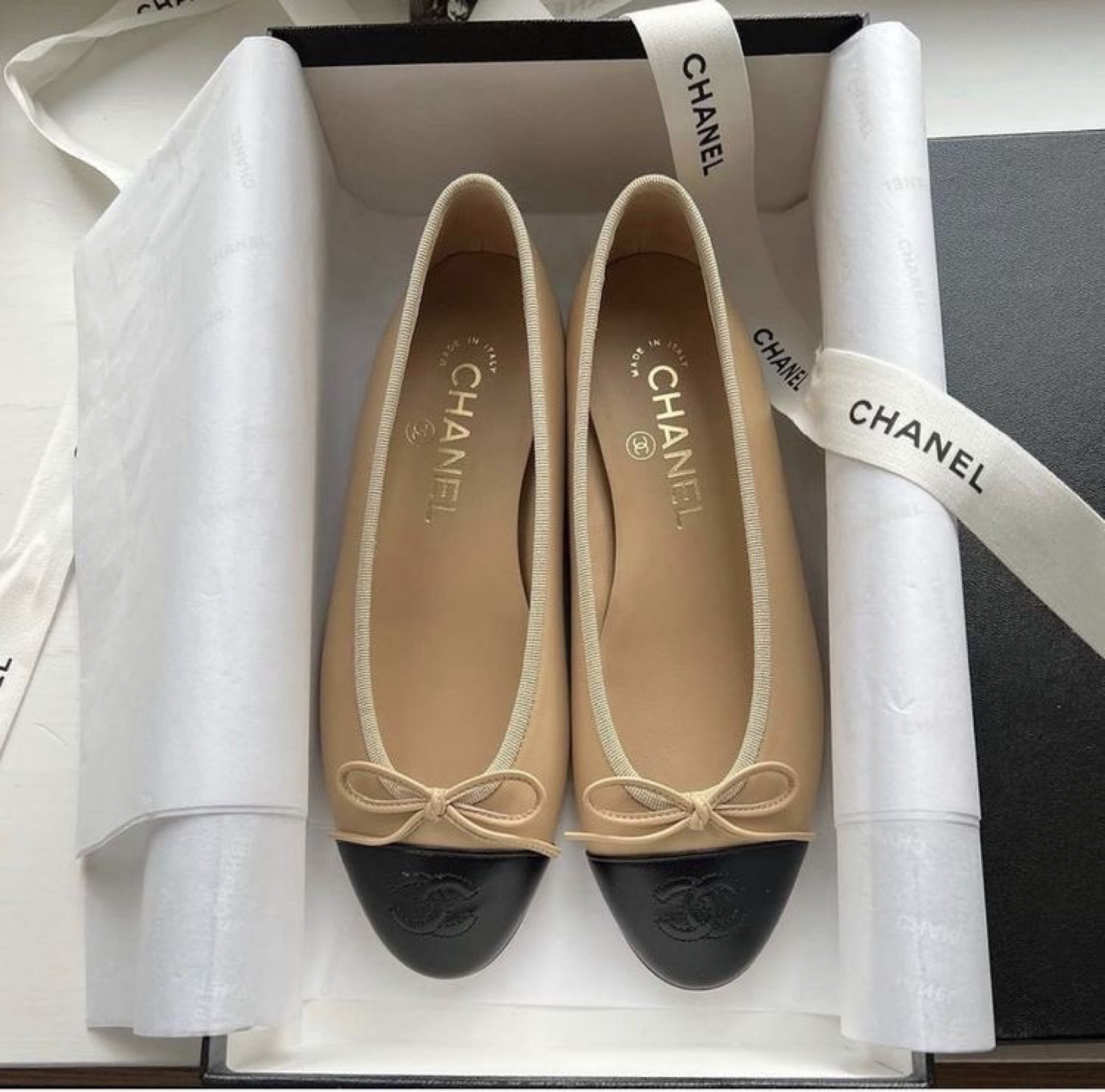 Elevate your style with these iconic Chanel ballerina flats 🌟 Crafted in classic beige and black, they’re the perfect blend of elegance and comfort. Ideal for any occasion, these flats add a touch of sophistication to every outfit. #Chanel #BallerinaFlats #LuxuryStyle #FashionEssentials #ChicEveryday

#LTKSummerSales #LTKSeasonal #LTKShoeCrush