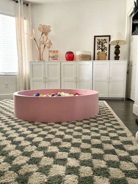 Checkered rugs are a great way to bring in color and pattern, especially with white walls! I have two of the checked rugs from Balta Rugs and Bed Bath and Beyond, they're super soft rugs and I love the colors! Mine are 8x10 sizes 

#LTKhome #LTKfamily