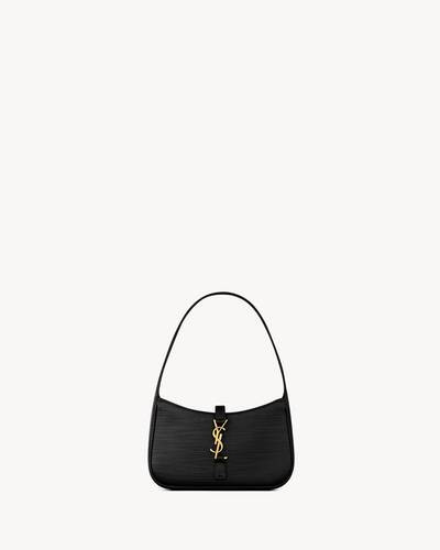 LE 5 À 7 MINI WITH A LEATHER TAB FASTENING, CASSANDRE EMBELLISHMENT AND MATCHING SUEDE LINING.Th... | Saint Laurent Inc. (Global)