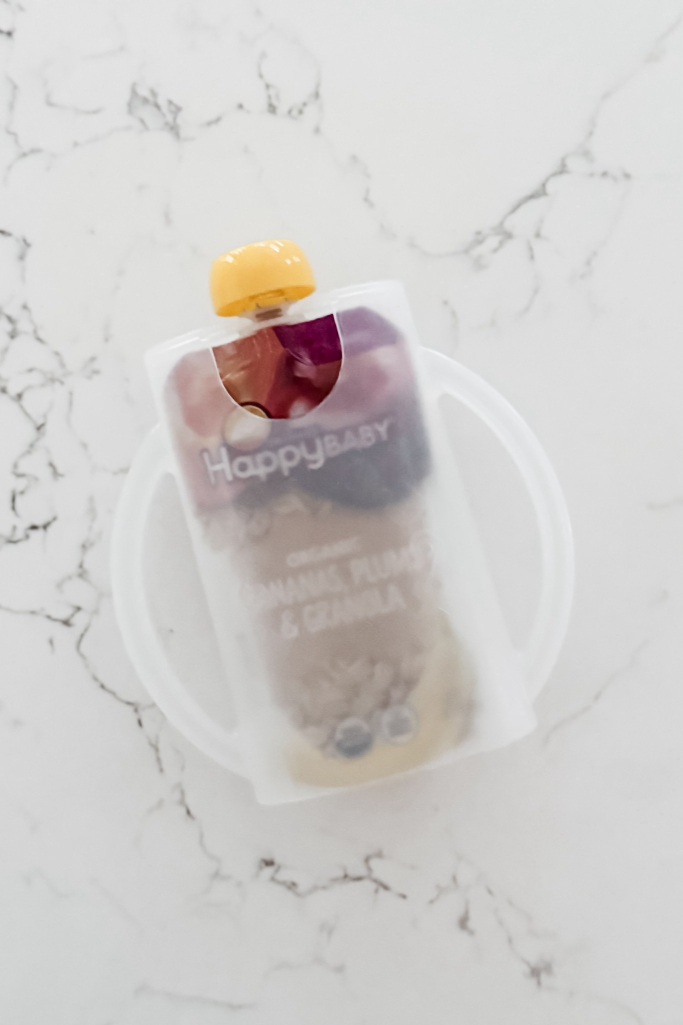 Chloe has been getting purées as part of her diet for a few months now, but always spoon-fed. Lately she’s been showing interest in eating directly from the pouches so we pulled out our pouch holder (in an effort to minimize messes) and it’s been a big hit! I had forgotten how useful this thing is.

#LTKBaby