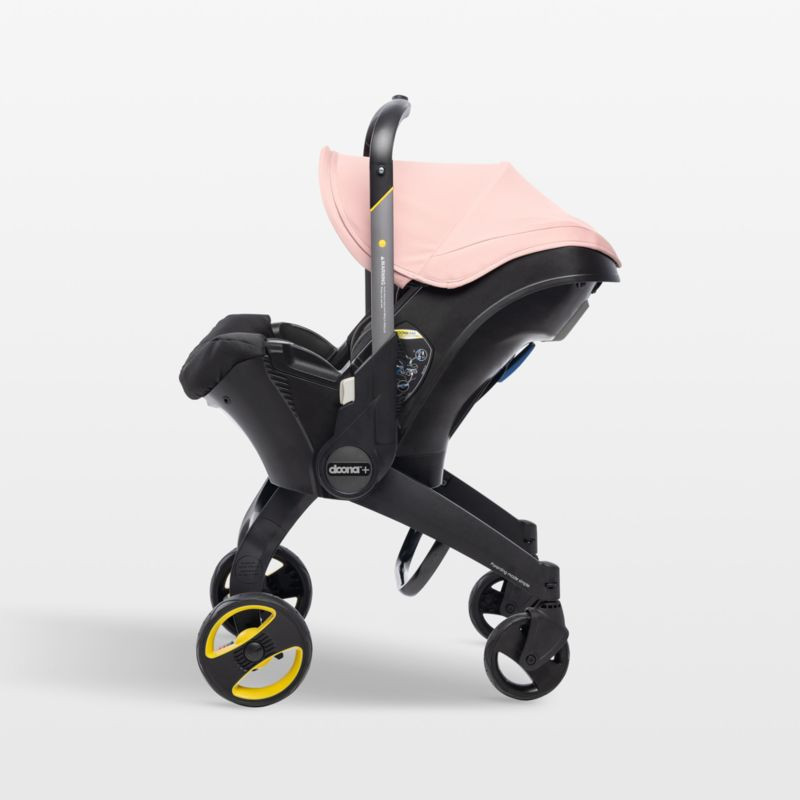 Doona Blush Pink Compact Infant Car Seat & Stroller with Base + Reviews | Crate & Kids | Crate & Barrel