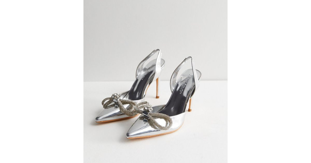 Public Desire Silver Bow Stiletto Heel Court Shoes
						
						Add to Saved Items
						Remove f... | New Look (UK)