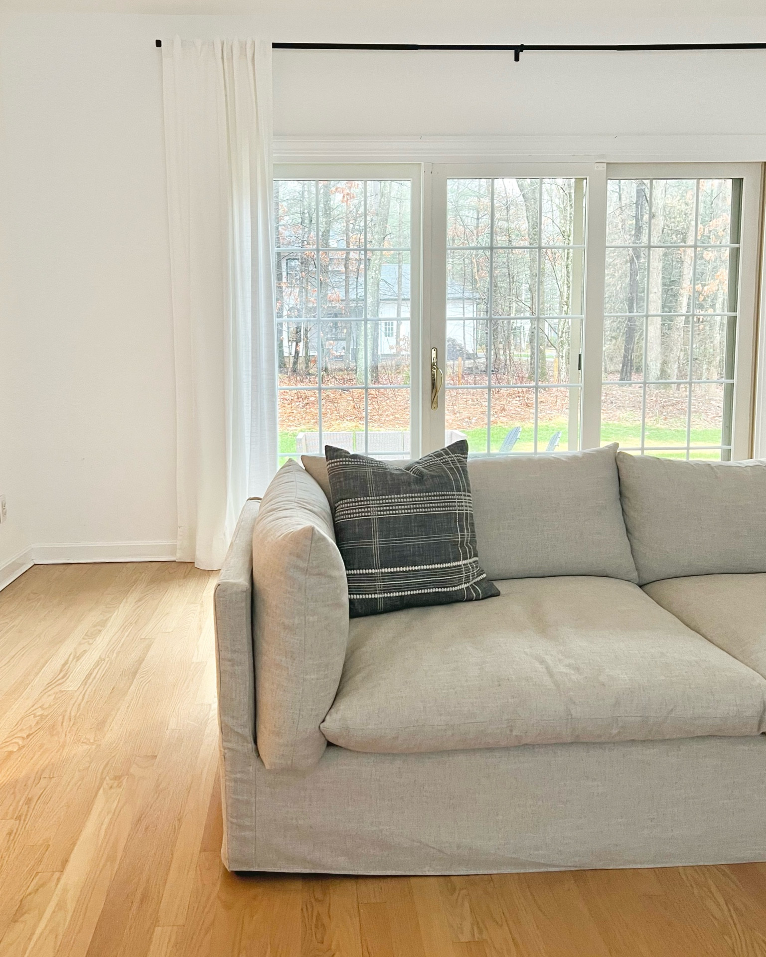 Comfortable sofa, slipcover sofa, deep sofa, lunge sofa, family room, living room, Chantilly lace, white walls, McGee pillow, target 

#LTKstyletip #LTKhome #LTKunder50