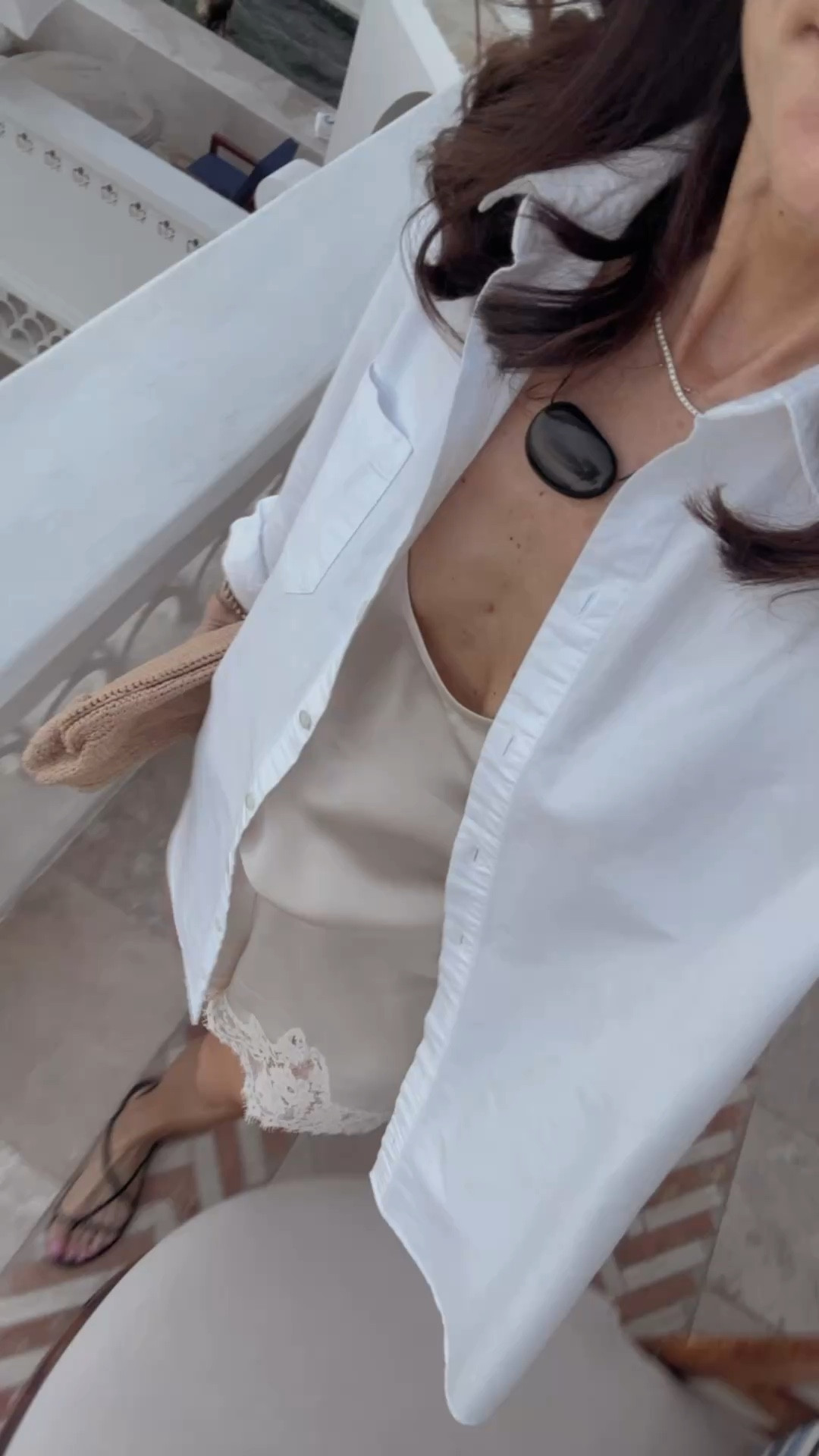 Easy way to wear an oversized white button down on vacation 
Layered over coordinating silk pieces 
Everything runs tts 
Spring break outfit 
Resort outfit 

#LTKOver40 #LTKPetite