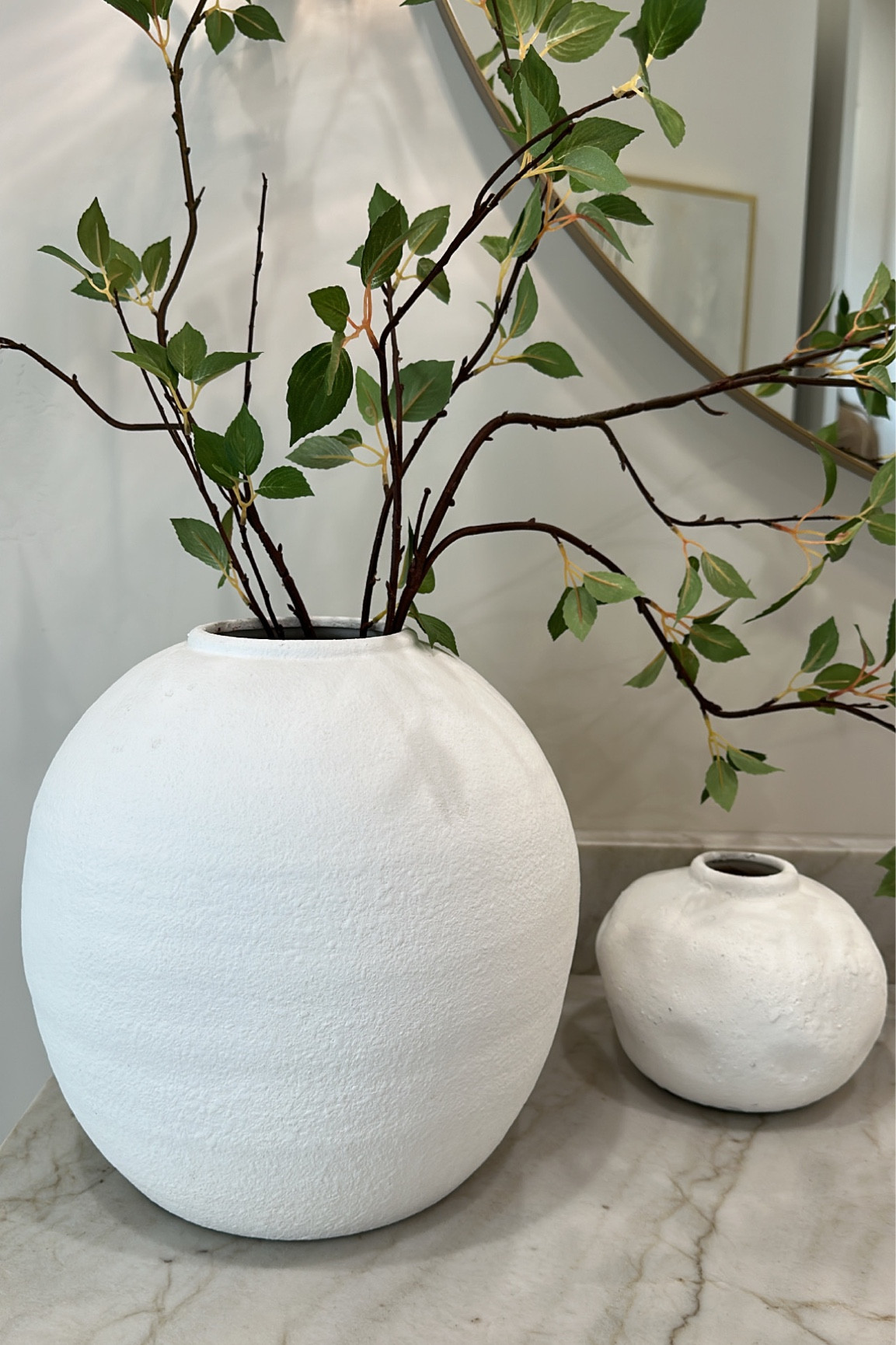 Pretty vases I spotted recently at a parade home!! I believe a large white vase is a design essential for every home!

#LTKFind #LTKsalealert #LTKhome