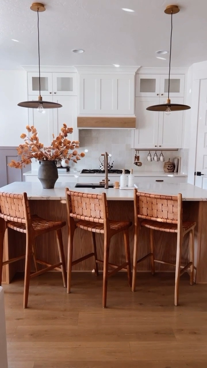 Pole wrap island hack made our kitchen look so warm and custom! Here is everything we used + our pendant lights and barstools! 

#LTKVideo #LTKsalealert #LTKhome