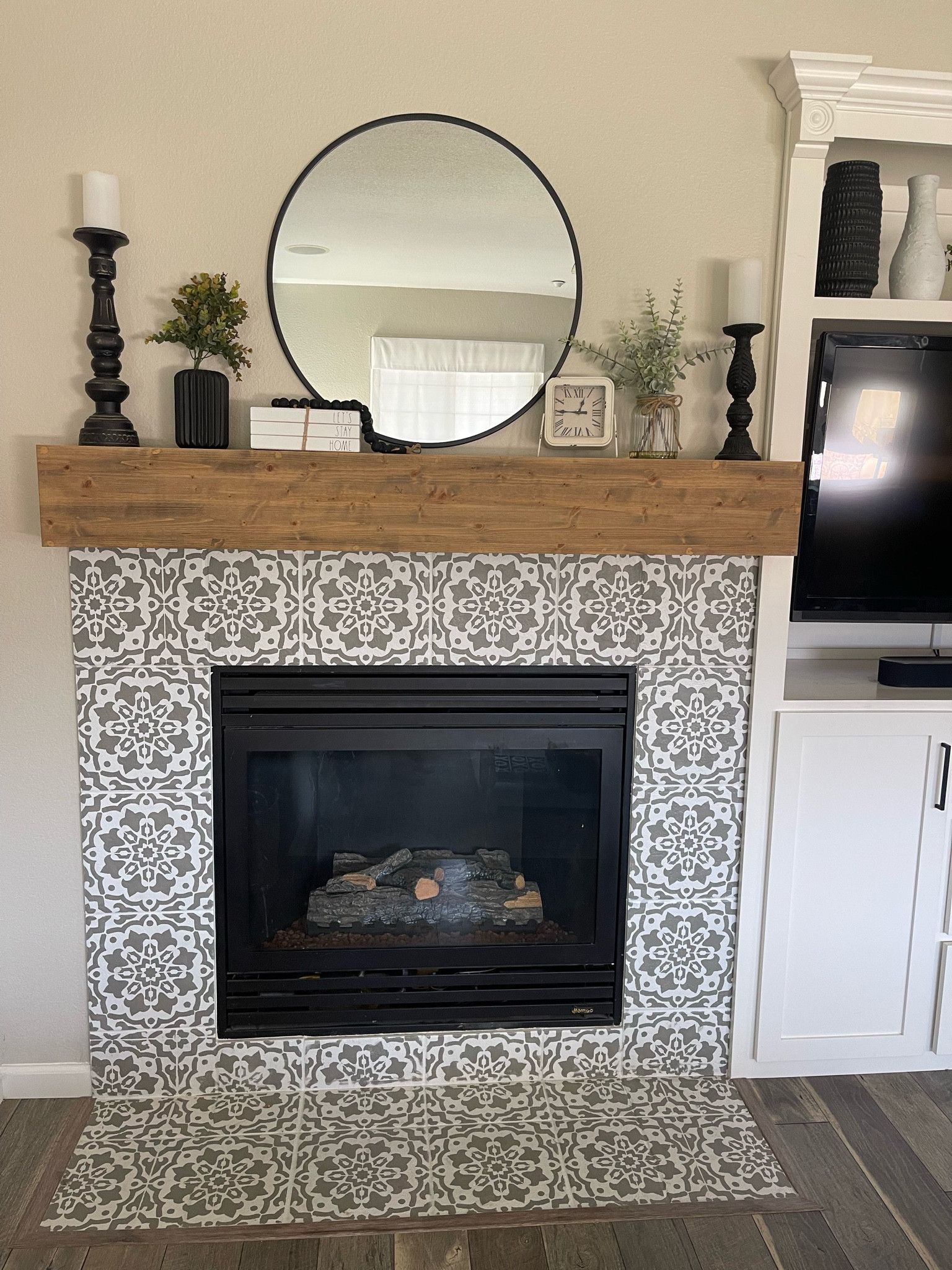 🌱FIREPLACE GLOW UP 🌱


When we moved into this home in 2020, I saw the potential of making this space cozy and fabulous! 

🌱painted the tile with a stencil 
(All materials included)
🌱wrapped the existing drywall mantle with wood
🌱 customized built in, in the nook! 

#fireplace #fireplace🔥 #fireplacemakeover #fireplacedecor #fireplacemantel #chunkymantel #cozy #cozyliving #cozylivingroom #woodmantle #stenciledtile #paintedtile #paintedfireplace