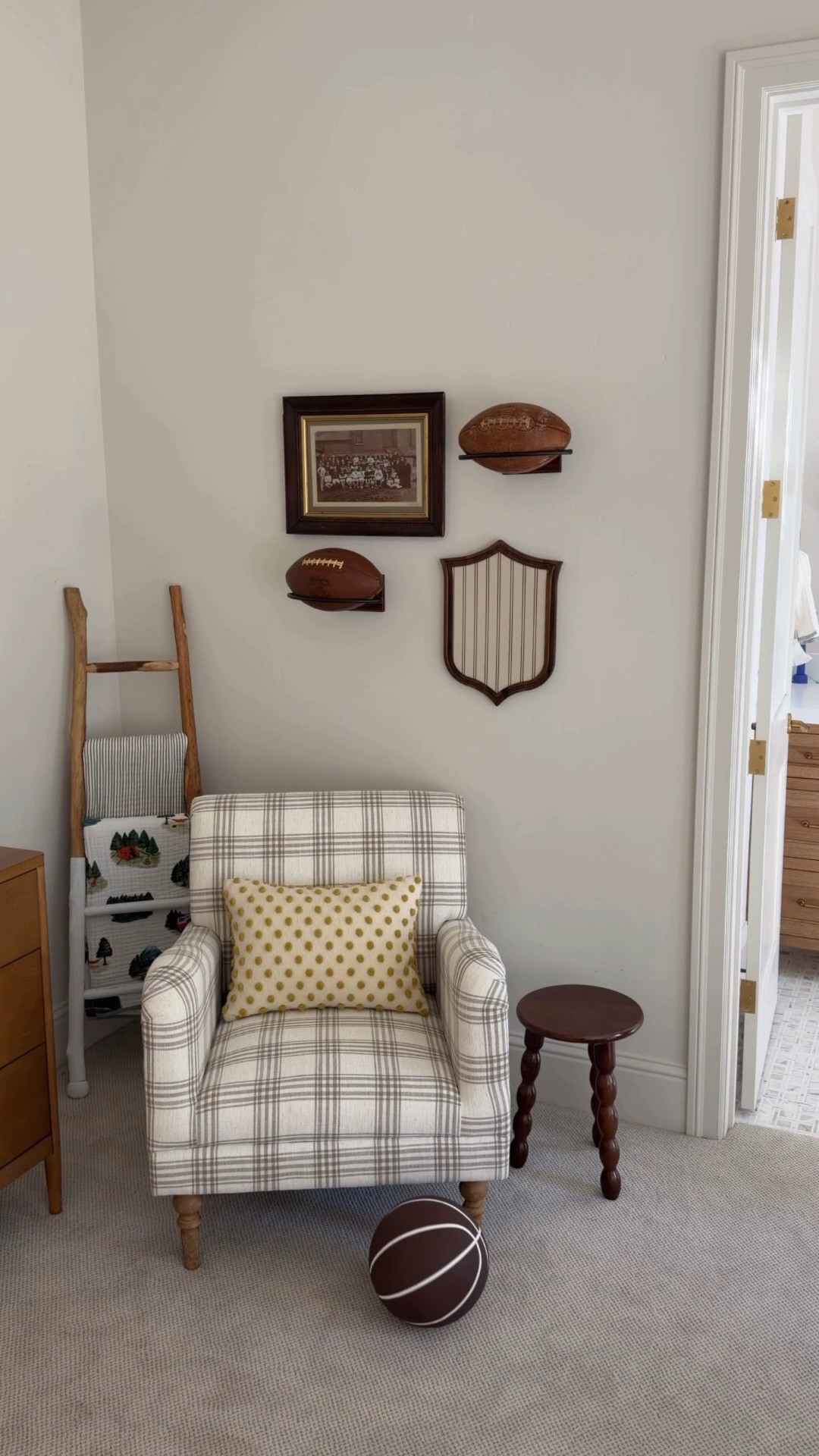 #ad The vision was always a room that felt collected, not decorated. 🤎🏈 

Old footballs, vintage finds, and one perfect chair from @Wayfair were all it took to make this little reading nook come to life. It’s amazing how one piece can make everything else click. ⚽️ 

Now onto the rest of the room. #WayfairPartner #wayfair @Shop.LTK #liketkit

#LTKHome #LTKKids #LTKSaleAlert