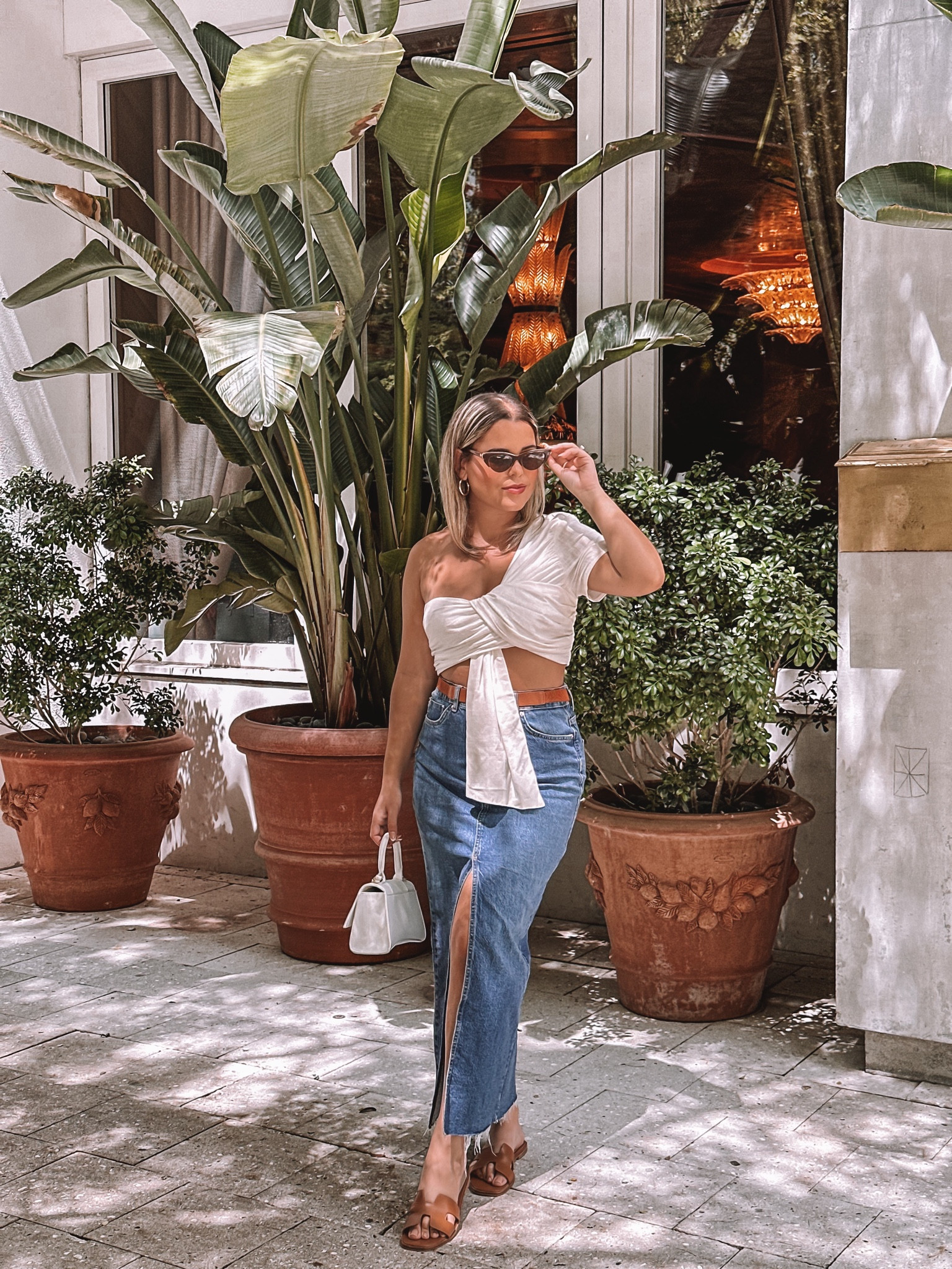 Casual Brunch Day look | Denim Slit Skirt with White Asymmetrical Top 

#denimskirt #casualoutfit #casualstyle #howtostyledenim #stevemaddensandals #summeroutfitinspo #summerlook #vacationoutfitideas #asymmetricaltops #simpleoutfits #sheintops 

#LTKstyletip #LTKunder50 #LTKunder100