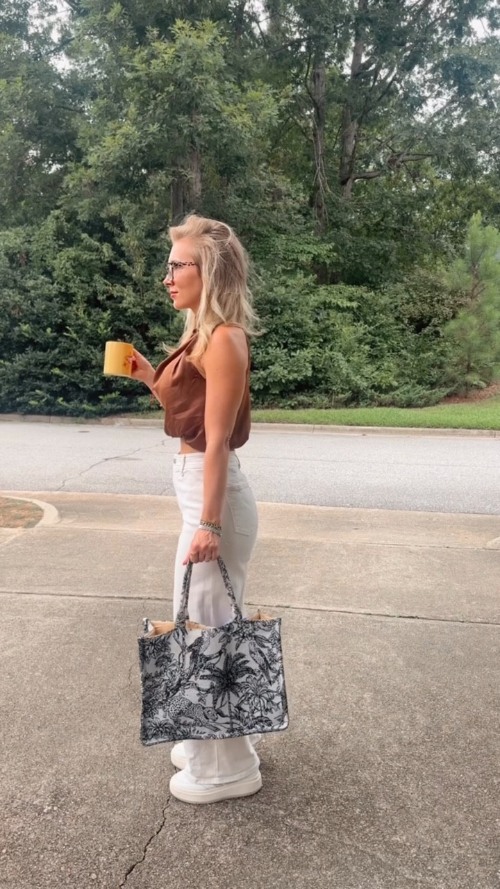 Tuesday fit 💻✨ + Evansville coffee mug 😊 Repurposing a formal set by pairing the top with my go-to @target jeans (I own them in multiple colors because they go with literally everything 👖) and my comfy @stevemadden tennis shoes 👟.

Obsessed with my @pavoi bubble ring and… not sure why my hair is standing so tall today but I’m channeling news anchor energy 😂. Blue light glasses are a must 🕶️ these came in a 3-pack so I can match them with whatever.

Everything is linked in my LTK in bio 🤍

#TuesdayFit #OOTD #TargetStyle #SteveMadden #PavoiJewelry #LTKstyle #ForYou #StyleInspo #Workwear