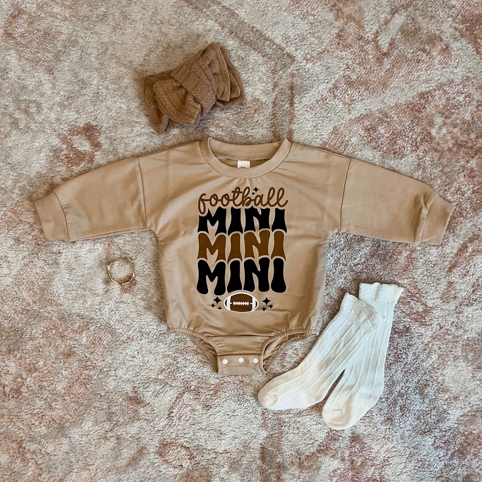 Sister is ready for football season 🏈

Football baby girl romper 

#LTKSeasonal #LTKfamily #LTKbaby