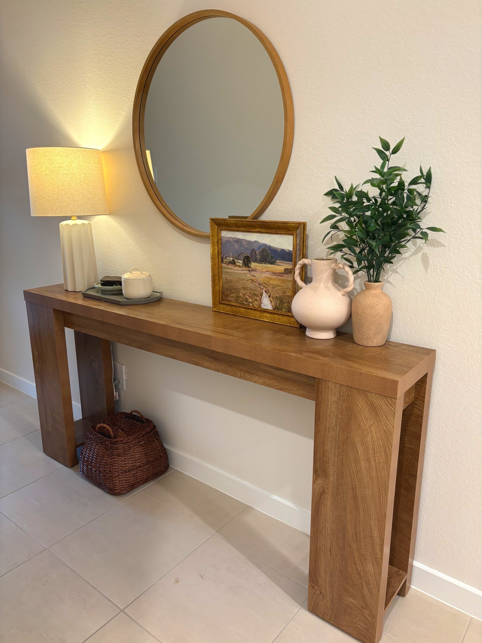 A cozy entry way to come home to! We have a narrow entryway so needed a long table and had to decorate with favorite finds from target! Love how well these items fit together to make it cozy and inviting! The perfect lamp, vases and wall art!#LTKSummerEdit

#LTKFindsUnder100 #LTKHome