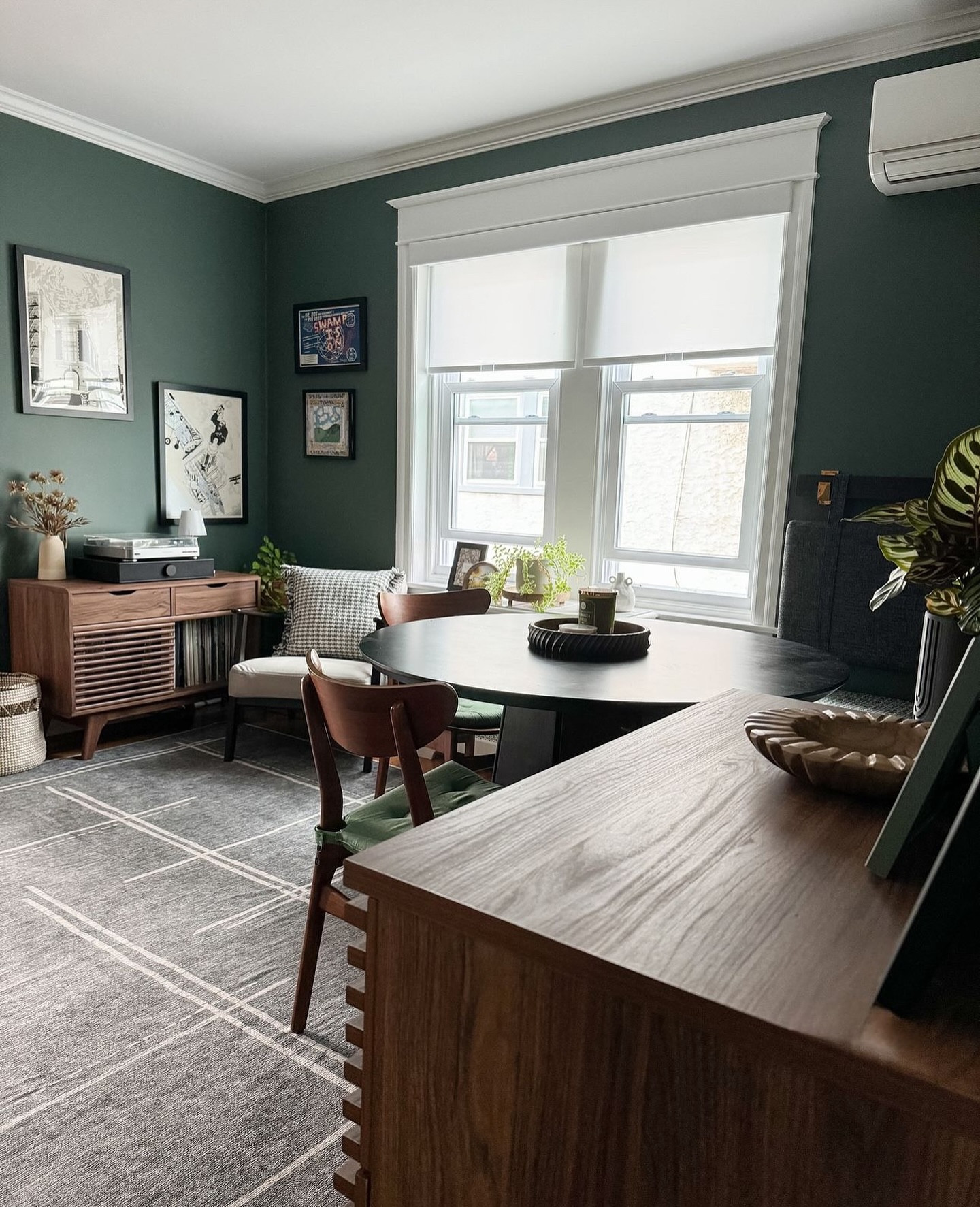 ✨✨ Transformation Tuesday, I mean Friday ! ✨✨

Say goodbye to the old dining room vibes and hello to this cozy lounge space! 🛋️🎲🎶 This little room might be small, but it’s packed with fun and function!

We removed the chair rail to let this bold color shine and added a washable rug to keep things comfy (and mess-friendly!). The banquette not only provides seating but is also a treasure trove of storage—perfect for game night essentials and toys that would otherwise be scattered on the floor. We got super creative and used headboards in varying sizes to create a cozy backdrop for the banquet and found the perfect custom seat cushions on @amazon. 

Whether my clients are spinning records, battling it out in board games, or just playing with the family’s favorite toys, this space is now the heart of their home. 💖

Swipe to see the before and after! ➡️

Paint color: @benjaminmoore Caldwell Green 


#HomeTransformation #LoungeLife #GameNight #InteriorDesign #MidCenturyVibes #CozySpaces #BeforeAndAfter