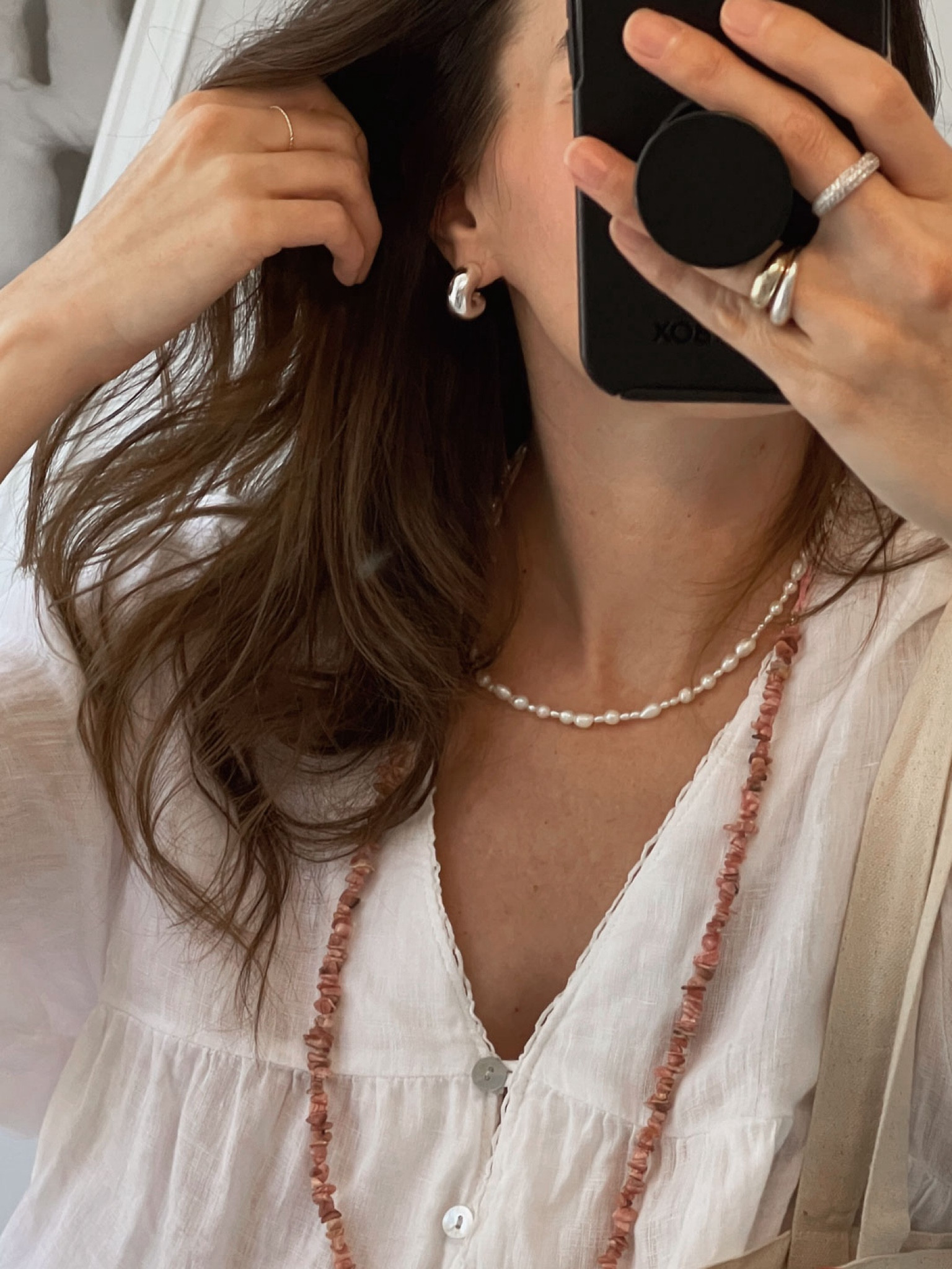 Current jewelry stack. I’m reaching for this pink long beaded necklace way more than I thought I would! Love it when that happens.  

#LTKfindsunder50 #LTKstyletip