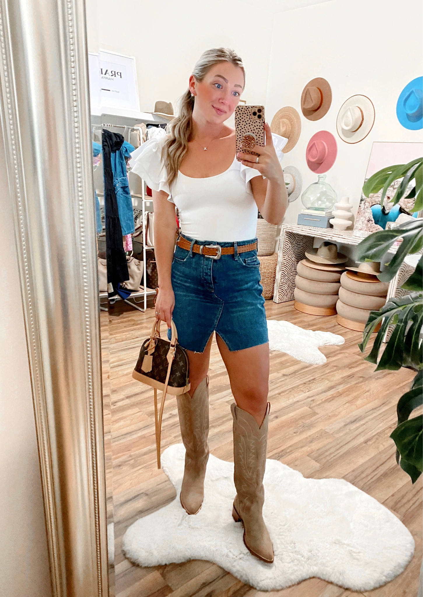 Express Flutter Top (size small) —on sale for $25! 

Tecovas new Abby boot in size 8 (I’m normally a size 7.5) 

Western outfit, Tecovas boots, Memorial Day Weekend Sales, Express, denim skirt 

#LTKunder50 #LTKshoecrush #LTKstyletip