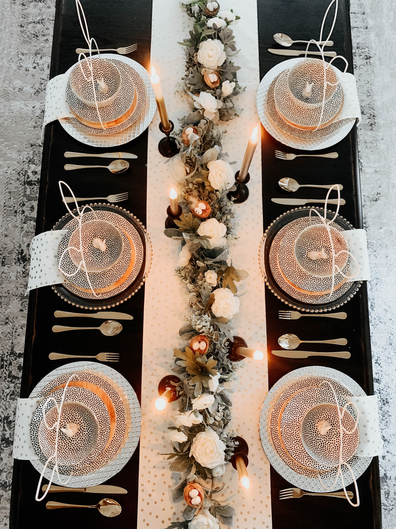 Glam inspired Easter table with metallic polka dot dishes and linens paired with white wire bunny trays. 

#LTKhome #LTKFind #LTKSeasonal