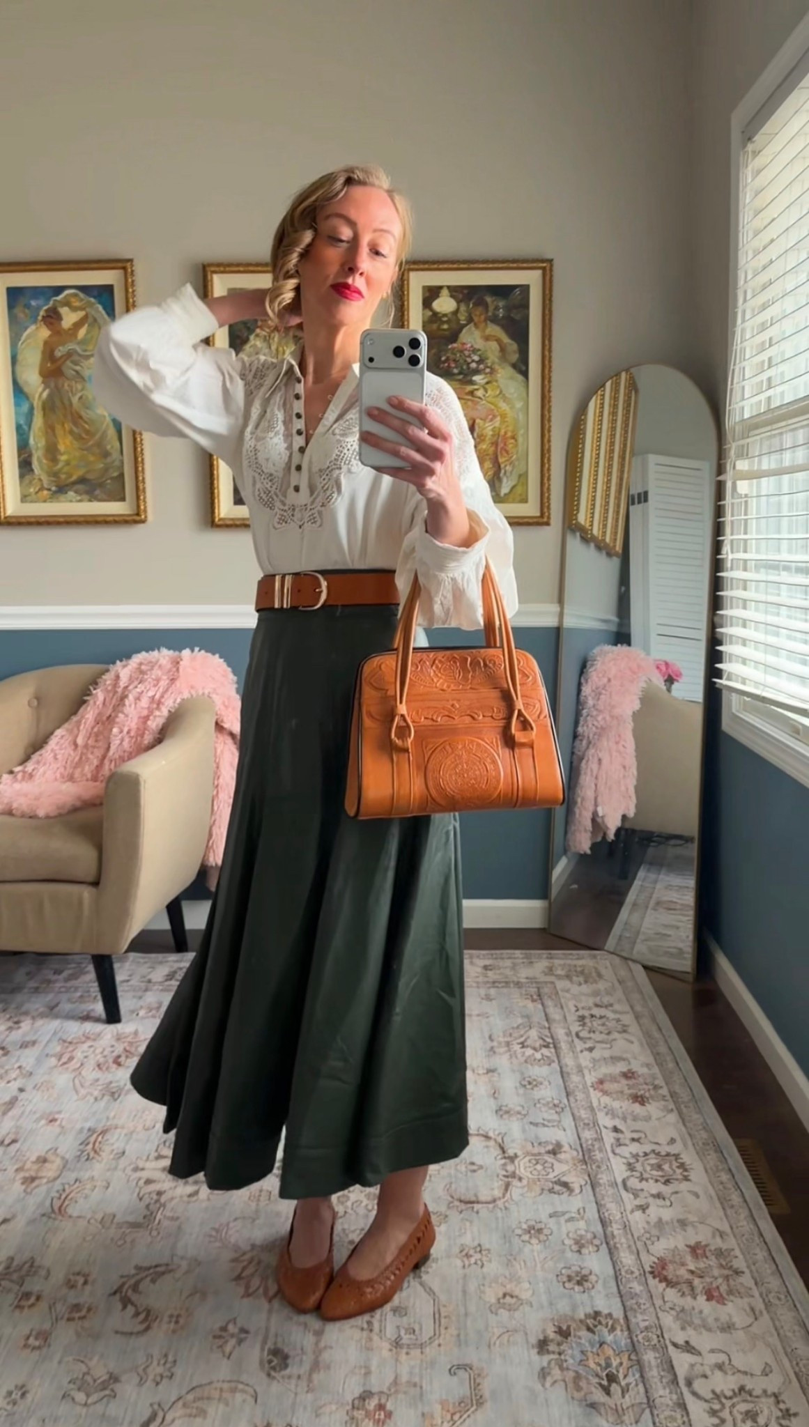 Ivory embroidered blouse styled with a green midi skirt, brown leather belt, woven flats, and a structured handbag.

Classic American style with a polished, timeless feel.

#LTKOver40 #LTKootd #LTKgrwm