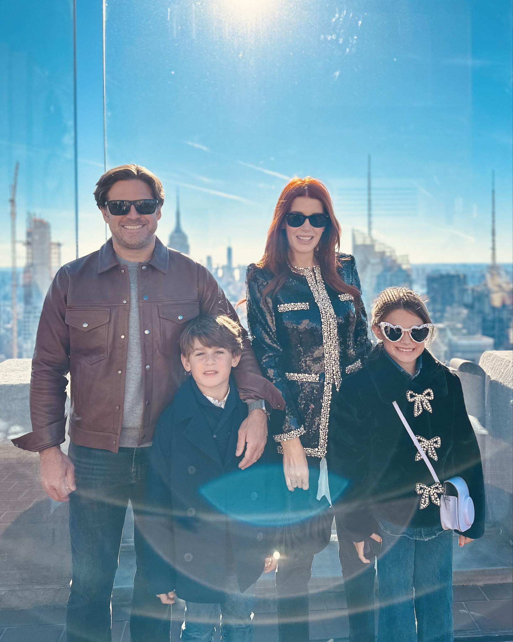 Top of the Rock!
Boyce had never been in a sky rise and he was thrilled with this experience. I love Rockefeller Center and its history - it’s inspiring to hear how one person can dream of and build something that changes a city. 
We had a drink and a pretzel at the top. For sure a highlight of our trip. 

#LTKFamily #LTKTravel #LTKParties