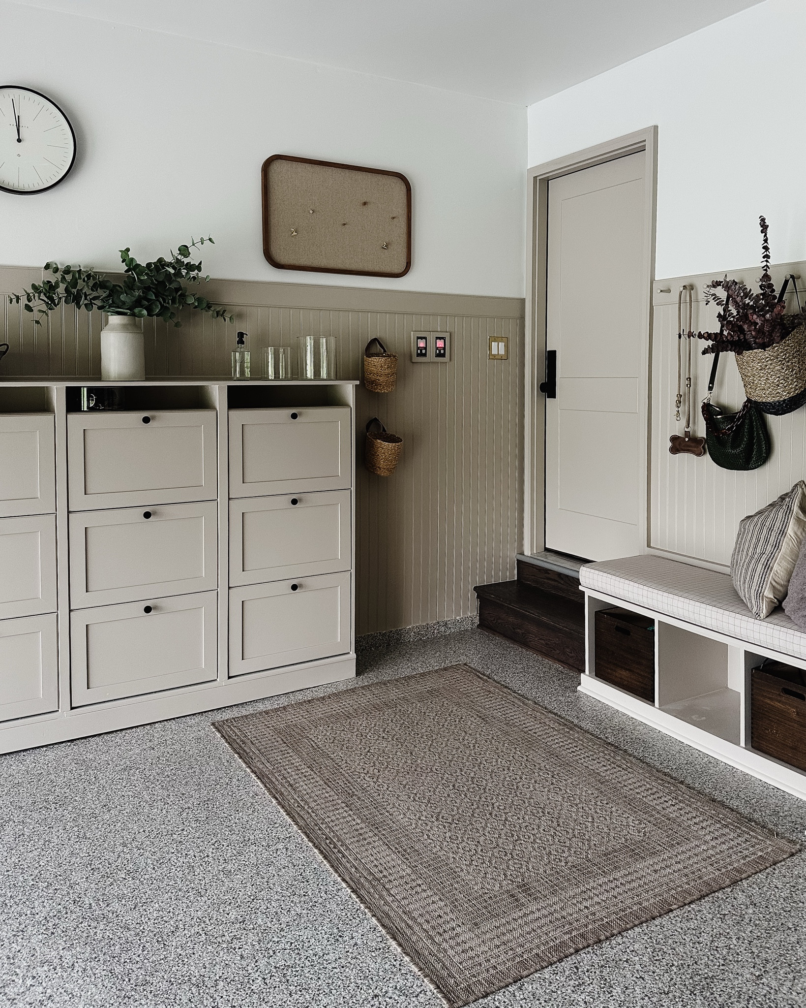 Shoe storage - Brusali from ikea
Cabinet hardware - linked here 
Wardrobe - PAX from ikea
Stair tread - linked here
Rug - linked here
Clock - linked here
Pegboard - linked here
Garage door - linked here 
