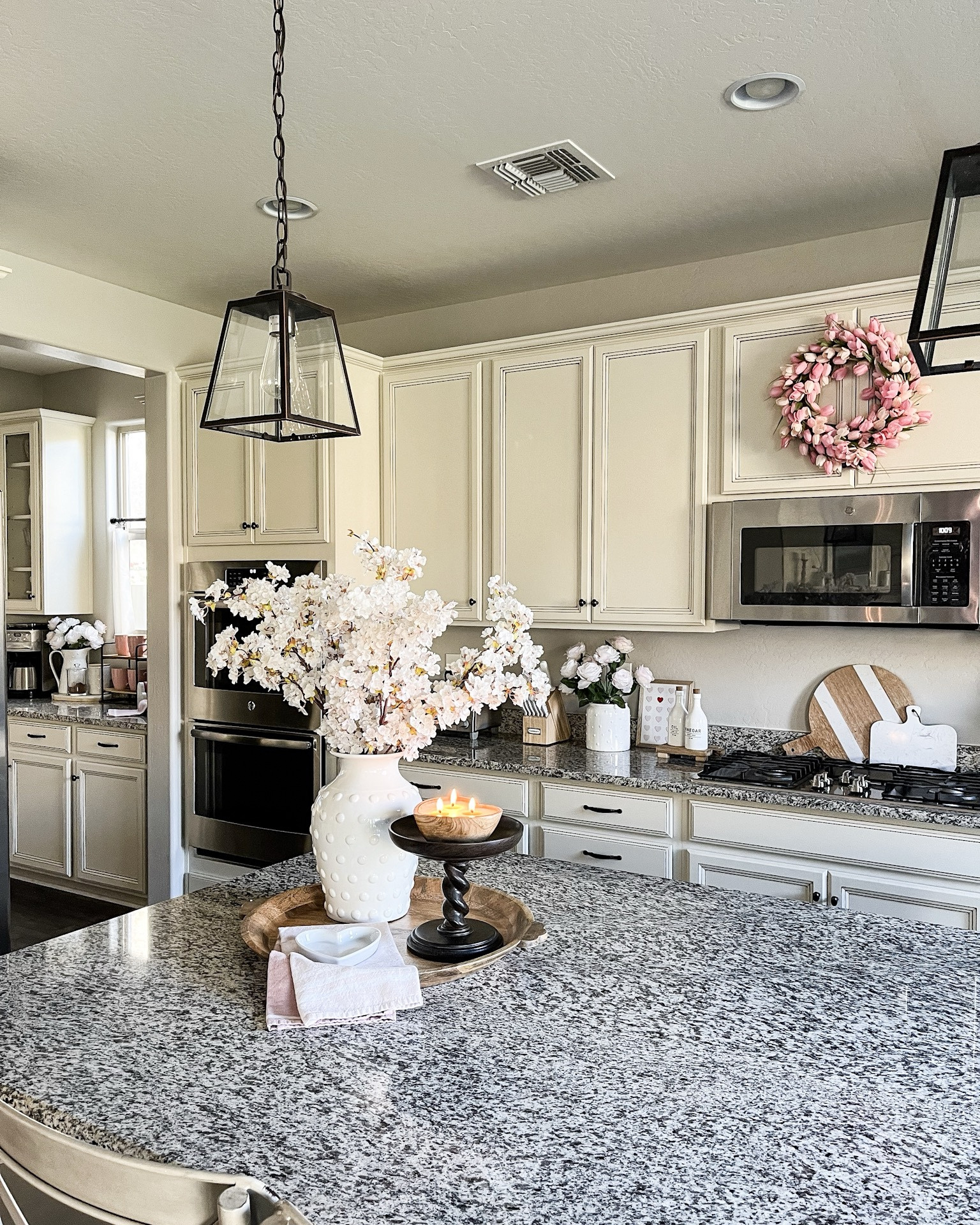 Valentine's counter and tray styling! Follow @lifeinmyarizonahome on Instagram for more inspiration. 

White vase | faux cherry blossoms | heart dough bowl candle pink dish towels | faux pink tulip wreath

#valentinesdecor #kitchendecor

#LTKSeasonal #LTKFindsUnder50 #LTKHome