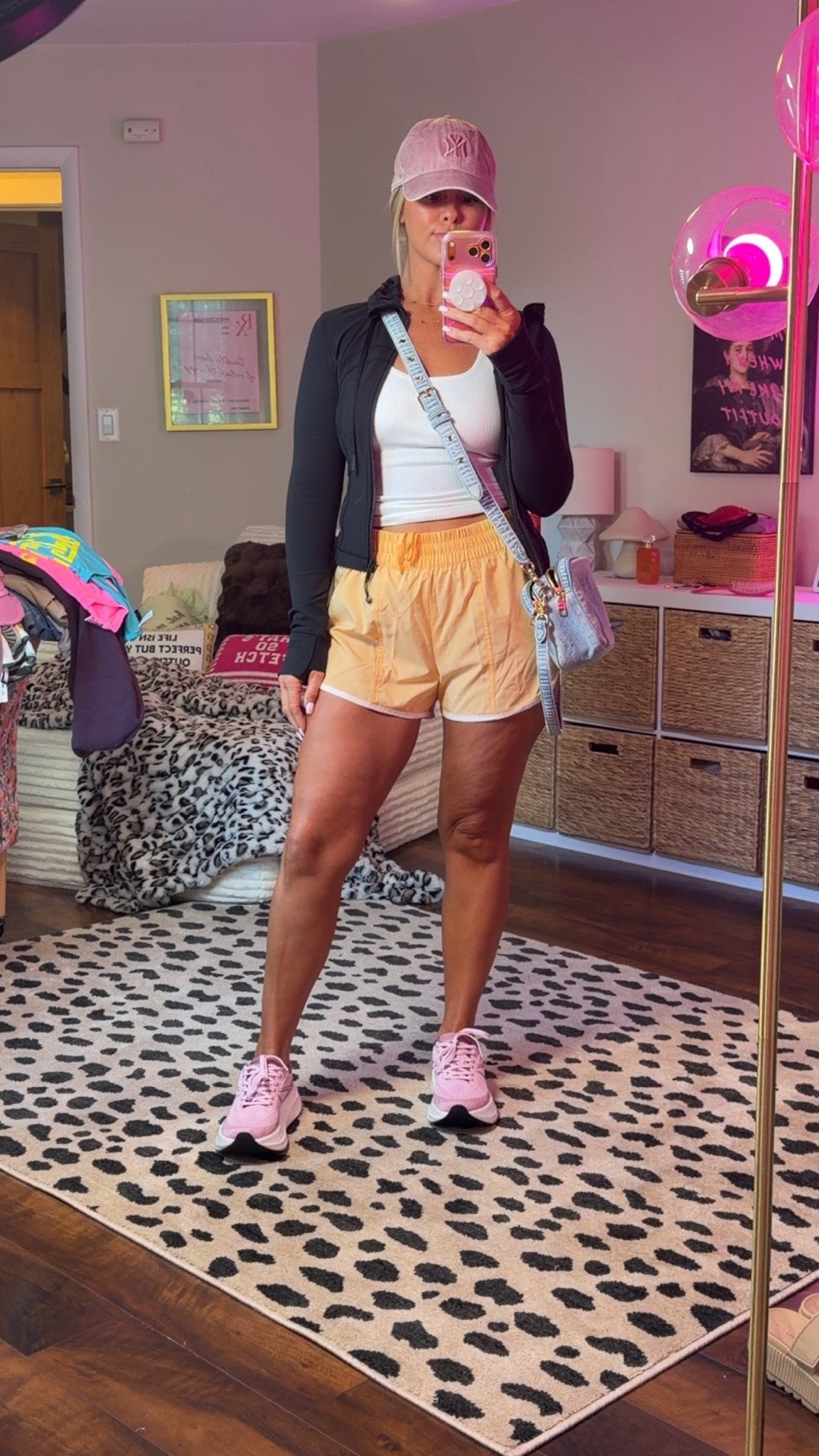 Size 6 in jacket small I’m tank medium in shorts shoes are on my tts and bag is coach carey denim