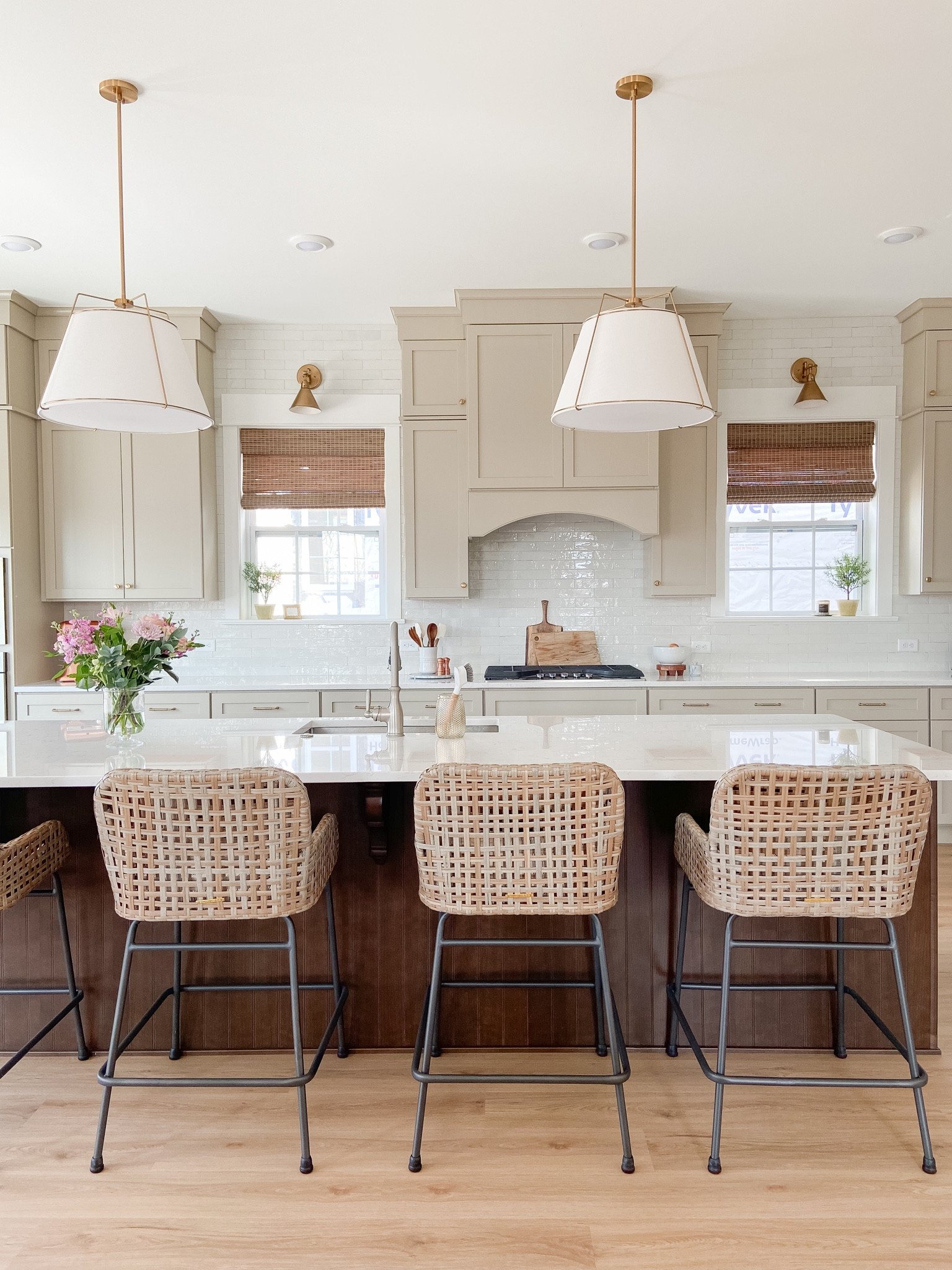 Kitchen finally coming along 💖
These counter stools are also currently on sale! 🙌🏼
#kitchendesign #kitchendecor #kitchenlighting #wallsconce #pendantlights #antiquebrass #wicker #romanshades #woodshades 

#LTKsalealert #LTKhome