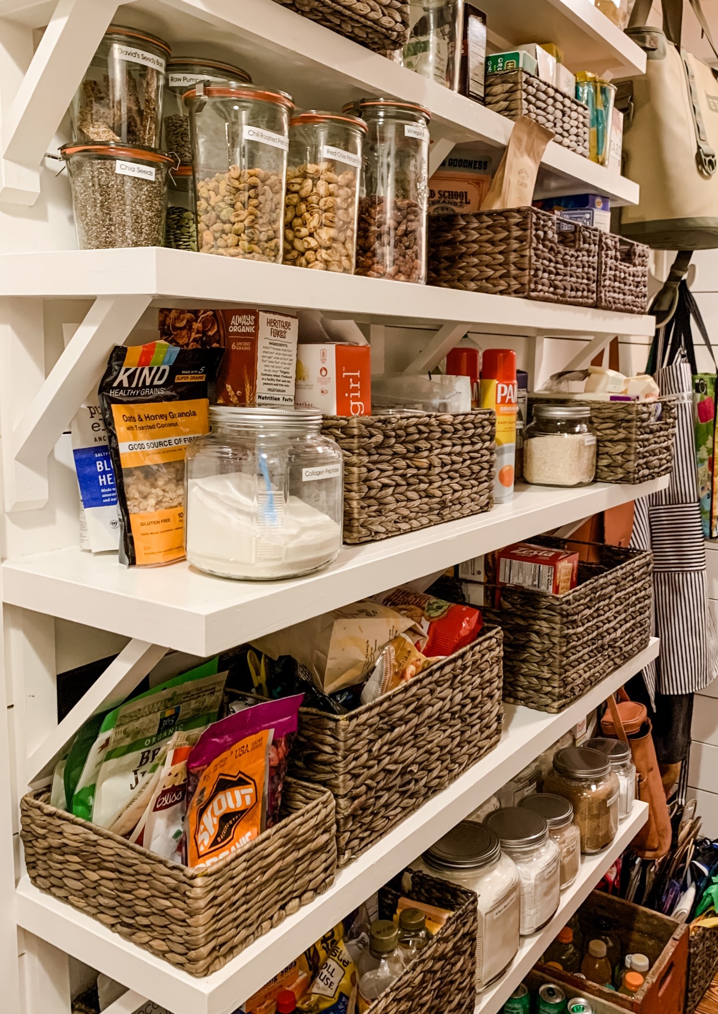 Pantry transformation complete. This space is semi public so my client wanted everything to look nice but also be accessible. Baskets and glass jars to the rescue  

#LTKhome