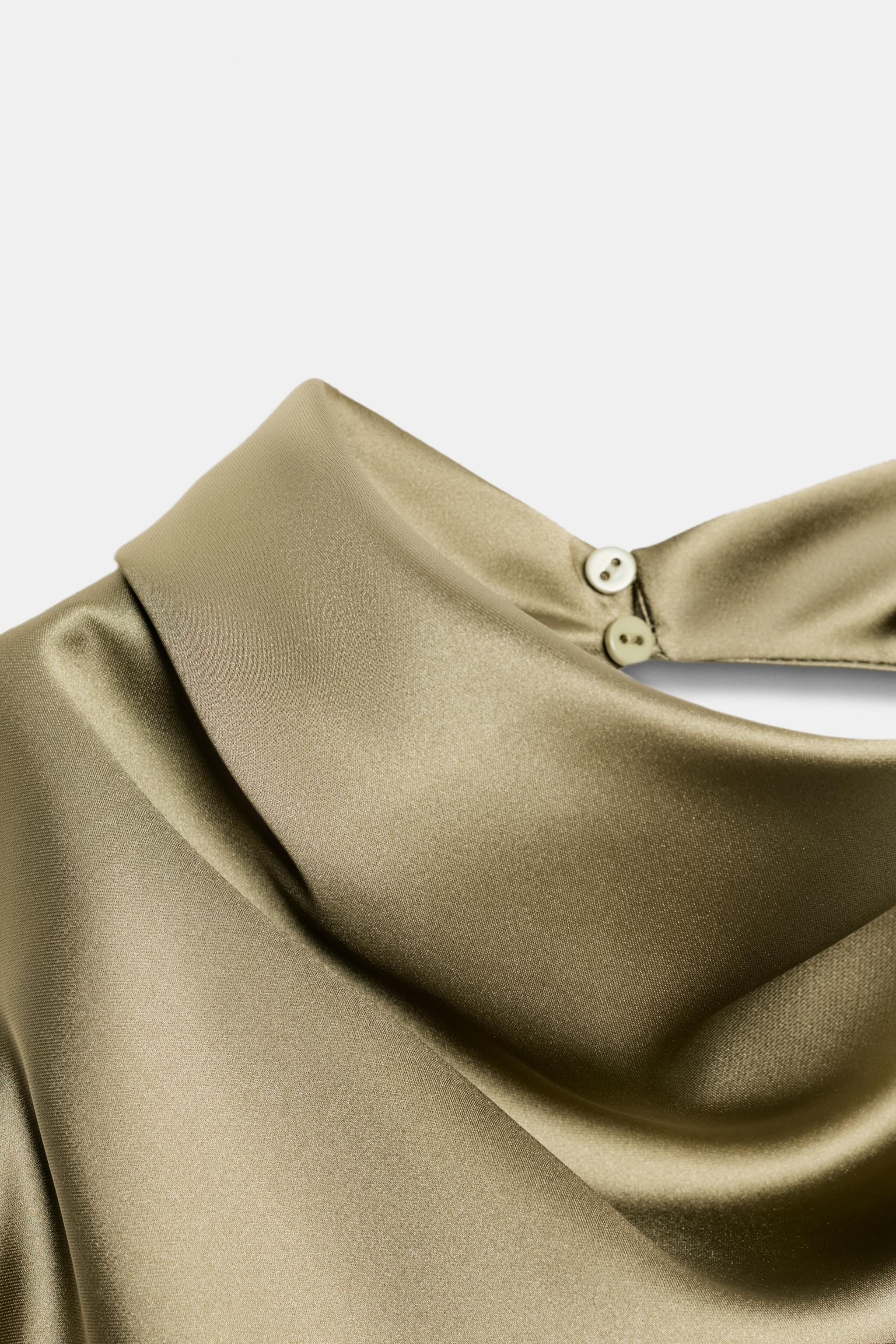 Halter neck top with an open back. Features concealed back button fastening. | Zara US