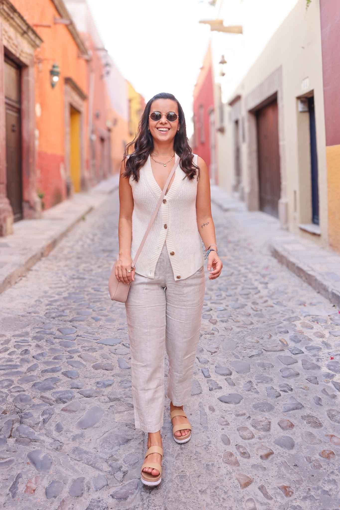 A thin flat sandal on European cobblestones will have you miserable by noon.
What you actually need: a sole with grip and structure underneath. The platform is what makes a sandal cobblestone-friendly. You get height without the instability of a heel, and you can actually walk in them for hours.
The other thing nobody tells you: even great sandals need breaking in. Walk them around the house for at least a week before your trip. Blisters on day one can take out an entire itinerary.
Which sandal style do you default to when you travel?

#LTKTravel