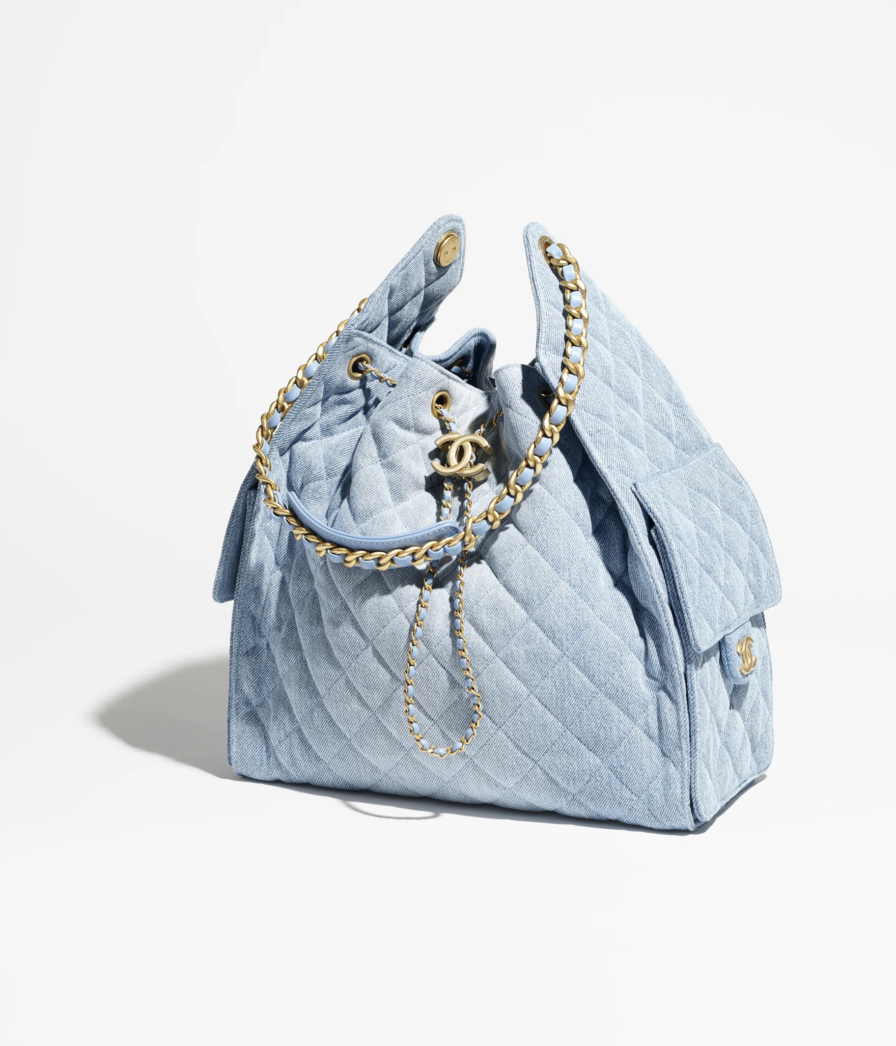 Chanel 25 medium handbag, Washed denim & gold-tone metal, blue — Fashion | CHANEL | Chanel, Inc. (US)