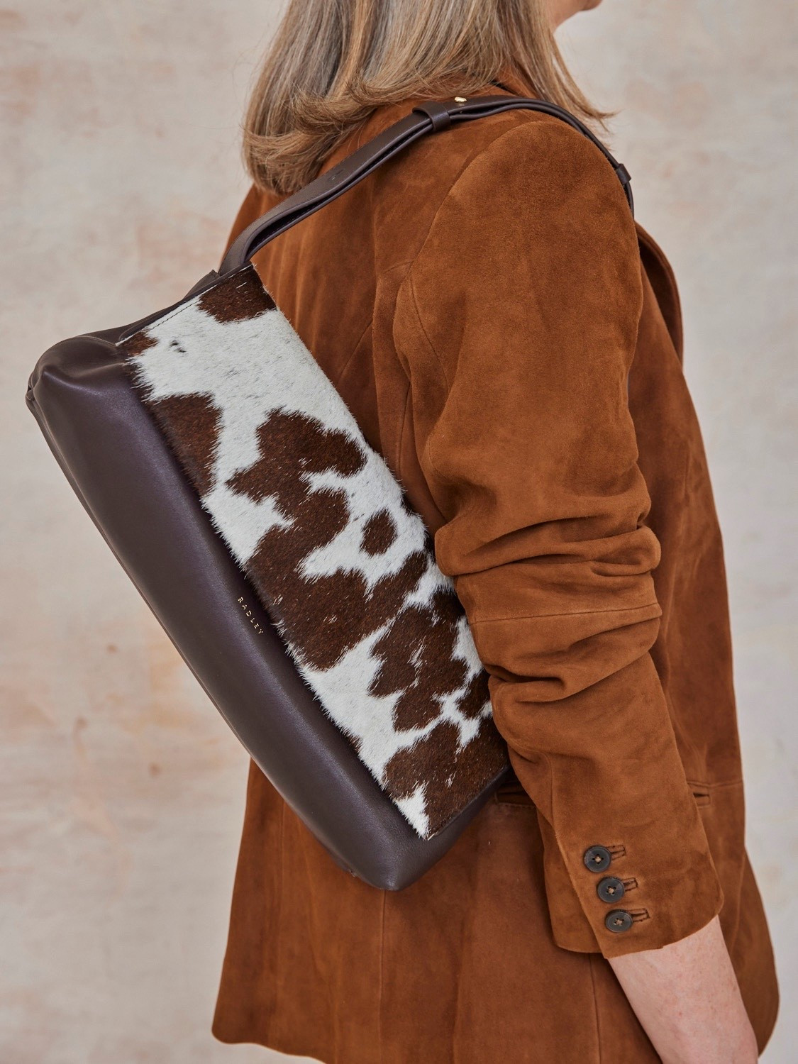 Moove over leopard spot, there's a new print in town!

Do have a cow, man - how to wear the latest animal print, is on That's Not My Age today.

And you can shop this Radley bag, and my other Fresian finds right here.

#LTKover50style #LTKuk #LTKstyletip