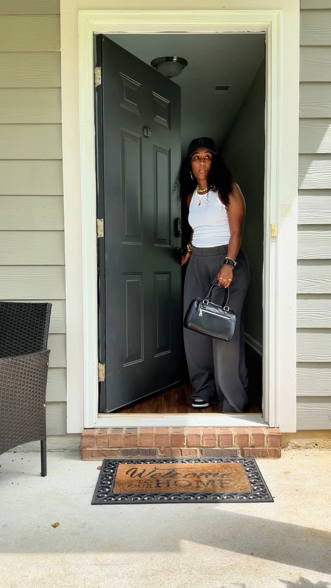 White tank and Aerie street trouser outfit. I styled this outfit with a black NY Yankees hat, black faux leather purse, and Jordan 1 sneakers.

#LTKootd #LTKOver40 #LTKPetite