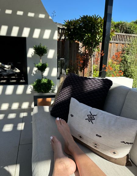 Feet up from here on out. Loving our outdoor furniture and how this space came together.

outdoor living, outdoor couch, outdoor pillows, outdoor fireplace, outdoor living space, backyard design

#LTKHome