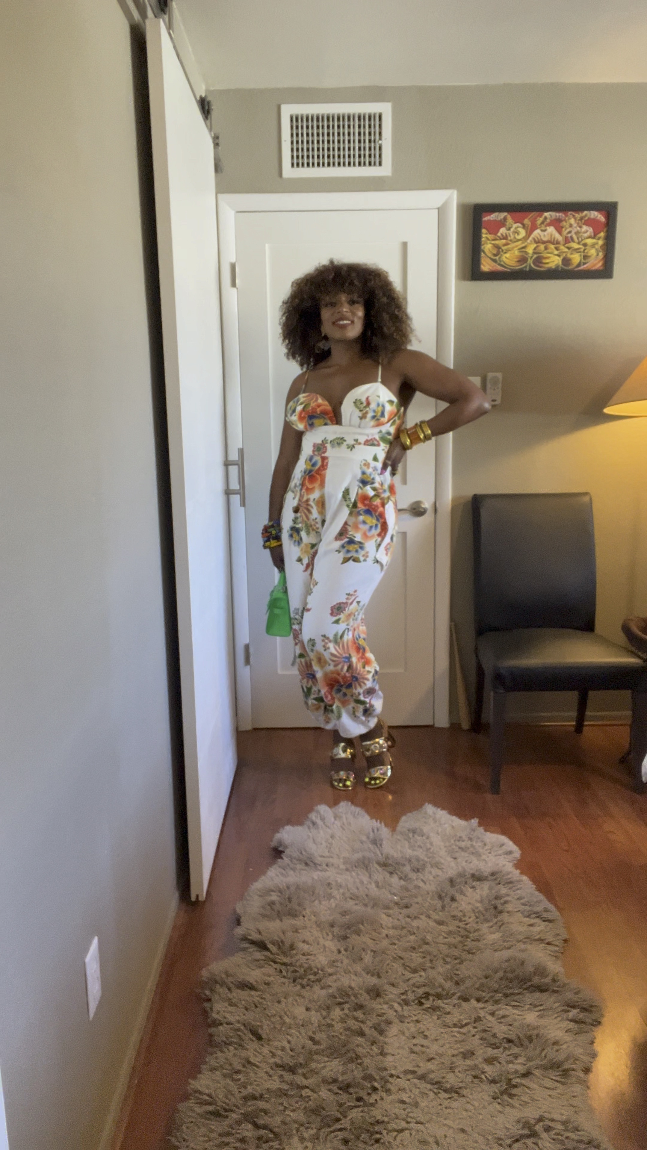 Country Concert Outfit or any elevated occasion to be honest! Got so many compliments on this jumpsuit with the deep v neckline & floral print, paired with neon green bag, brown earrings, gold accessories & heels &  a red lip & I was good to go!