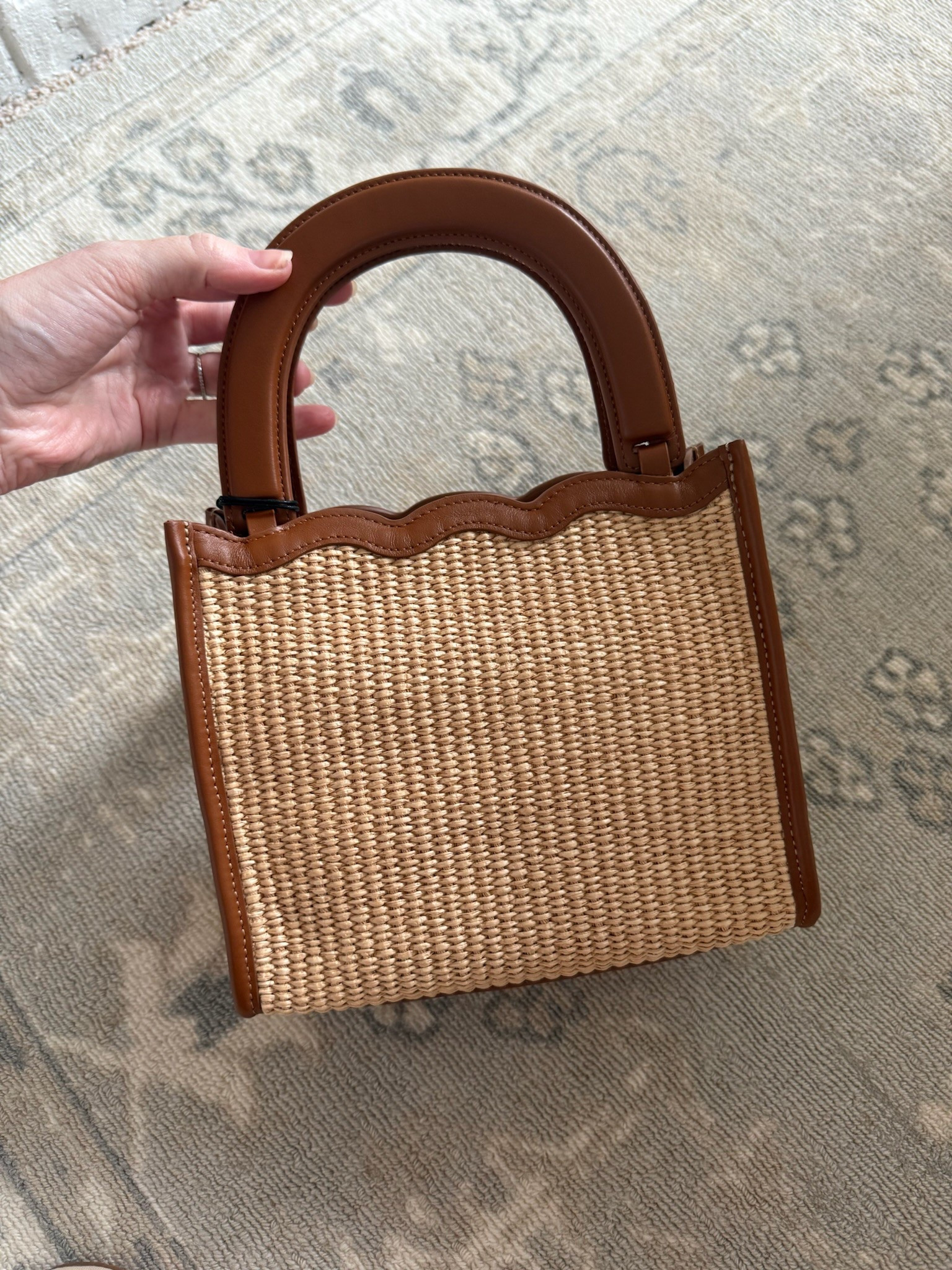 How cute is this mini top handle bag?! It would be perfect for a summer date night out! Summer bags // handbags // small handbags // vacation bags 

#LTKSeasonal #LTKItBag #LTKStyleTip