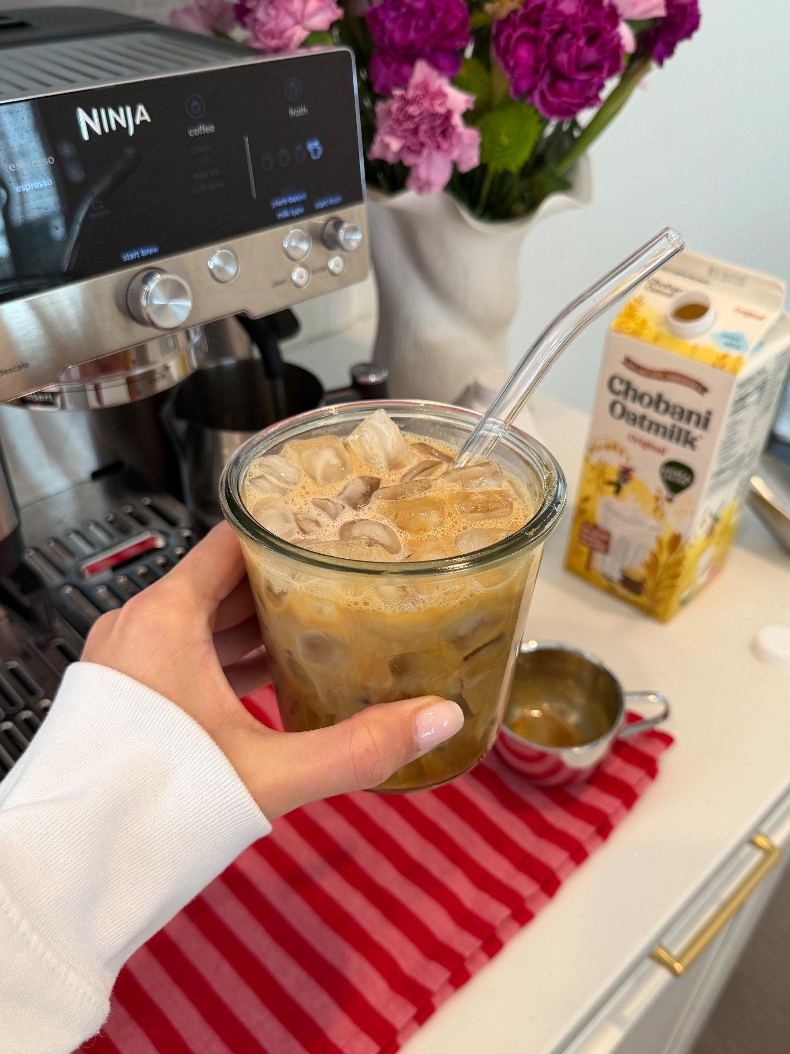 the most delicious at home latte ☕️🍯
- brew a double shot over some honey & a pinch of salt
- add ice, chobani oat milk, espresso & the elmhurst vanilla oat creamer 

#LTKHome #LTKfoodie