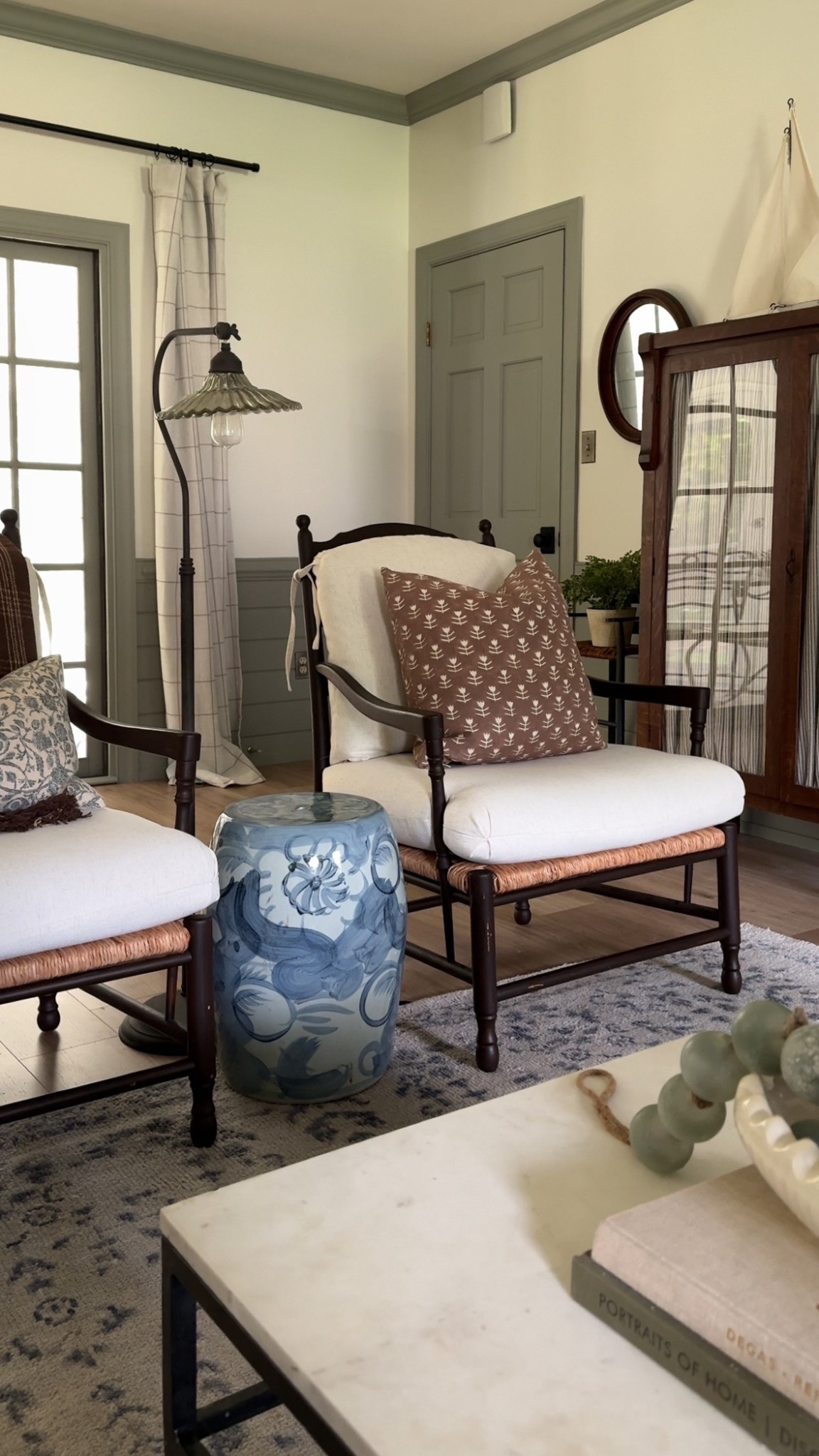 Moody Coastal Colonial style living room.