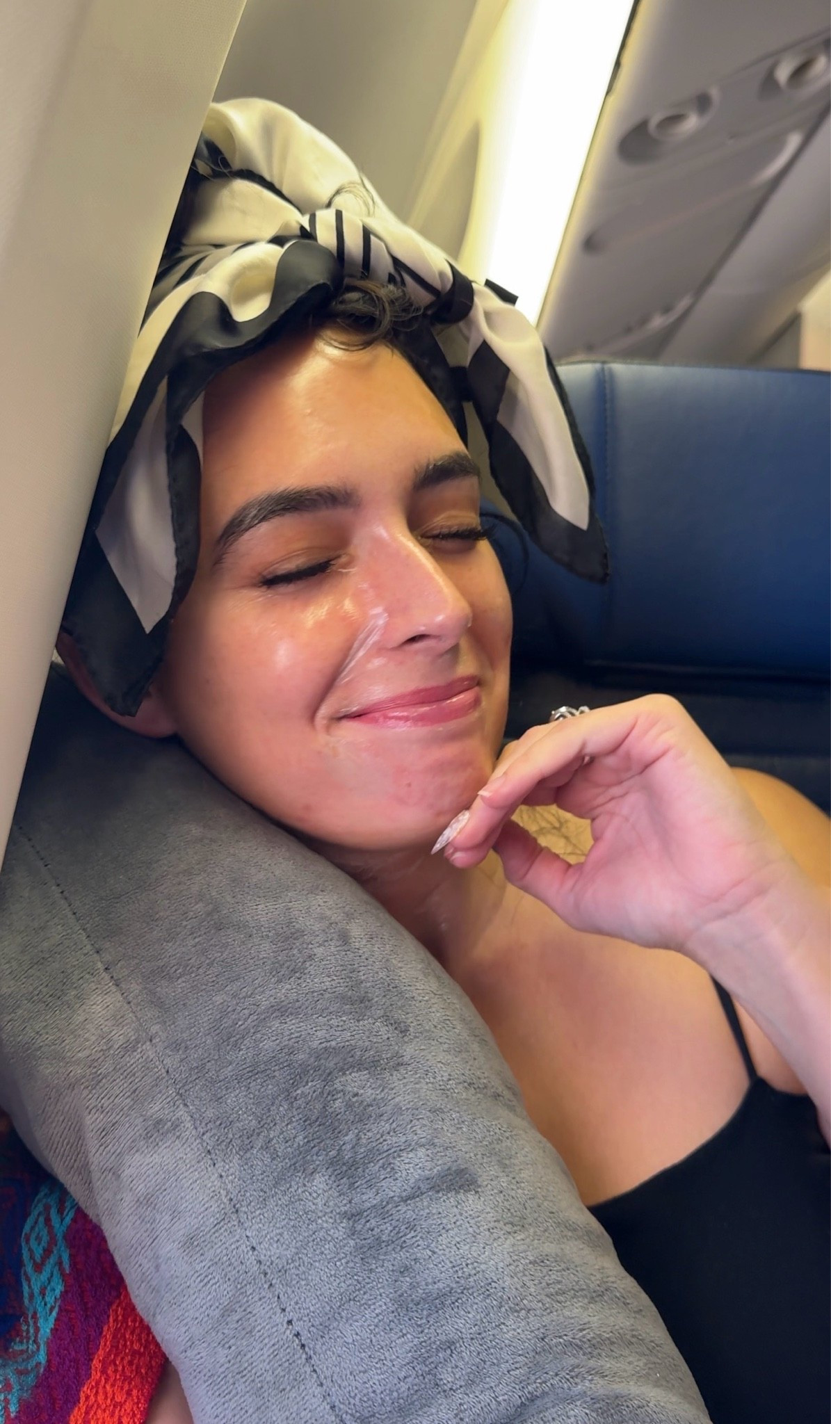 I swear by this mask for long flights. I put it on before so that it creates a barrier between my skin and the air and locks in hydration during the flight. 

I don’t know what’s flying around in the air and bacteria so I feel like it protects that exposure and it creates a barrier so that the cabin isn’t taking so much moisture from my face. 

Since it’s a clear gel I can apply it right before I board in better air. My face is a little shiny when I board but nothing crazy. Then the film starts filming around 10-15 min later. It’s subtle except around the edges. 

Then afterwards I take it off and my face is so dewy! 

Airplane hacks