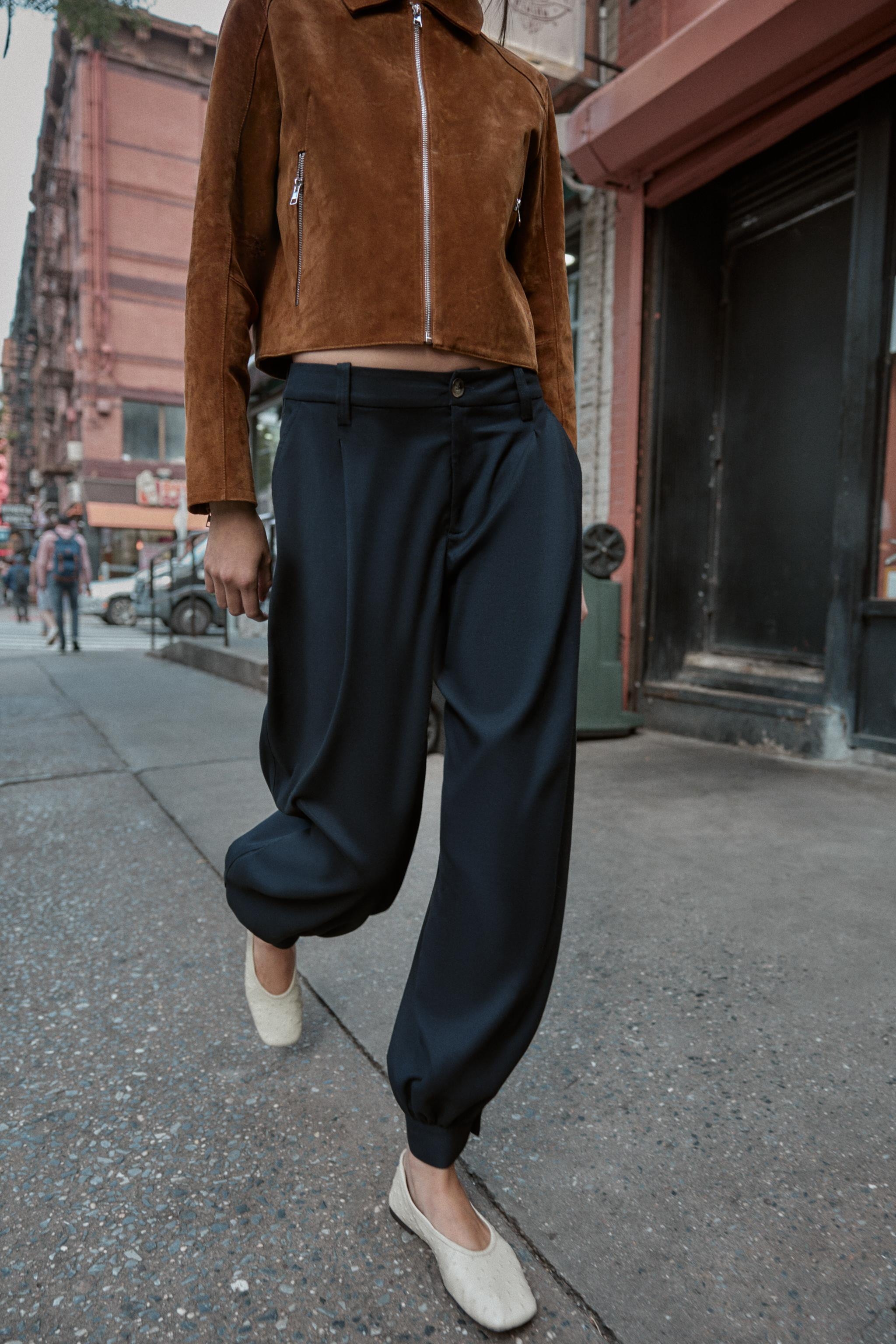 PLEATED PANTS WITH BUTTONED HEM | Zara US