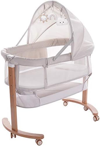 Baby Bassinet Bedside Sleeper with Wheels Storage Basket Canopy 3 Hanging Toys Newborn Cosleeping... | Amazon (US)