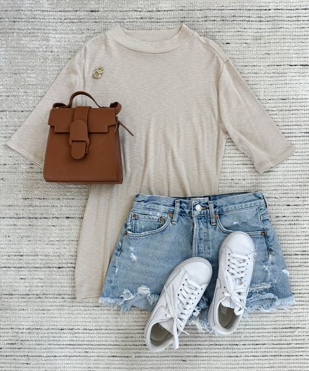 Summer casual outfit with relaxed oat tee paired with jean shorts and sneakers. Great outfit for running errands, grabbing lunch or a casual weekend outfit. These are my favorite Jean shorts ever, but I recommend sizing down! Linking very similar tops that are still in stock

#LTKSeasonal #LTKstyletip