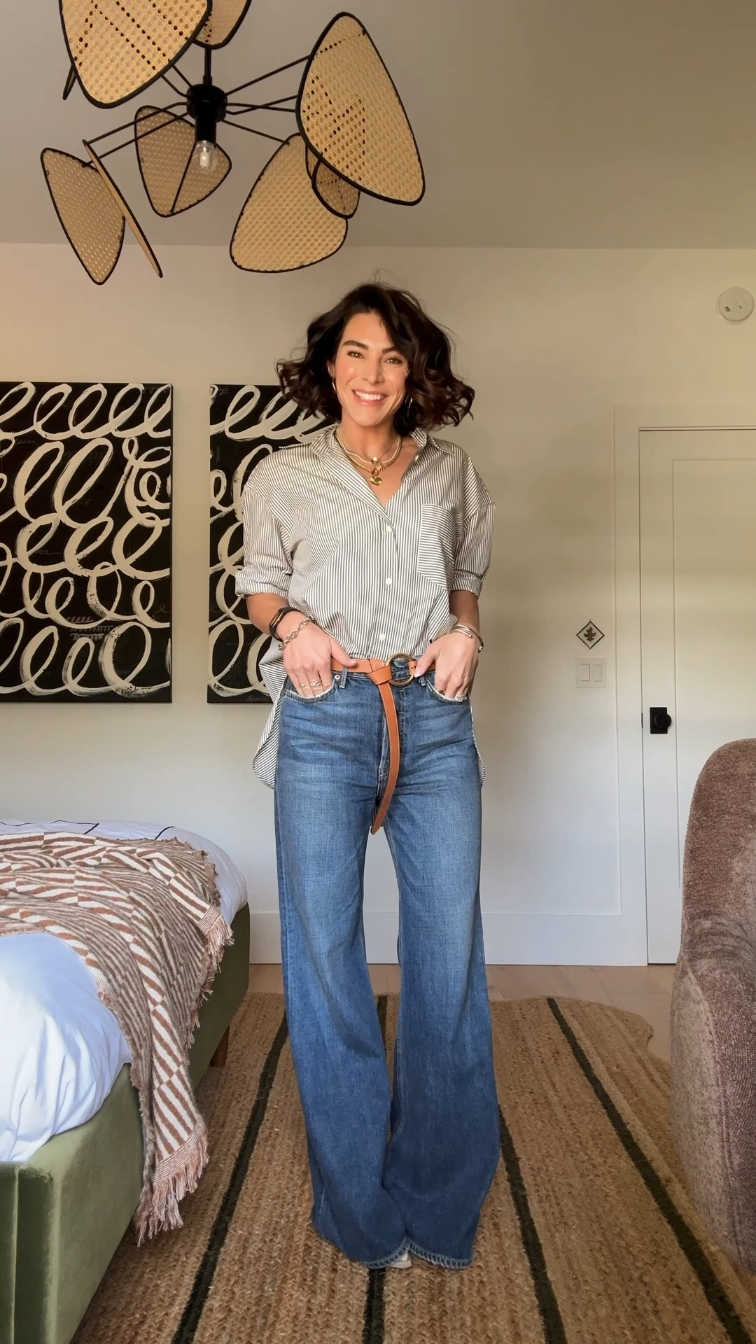 Oversized button up shirt wearing size xs. Very crisp cotton! Jeans are old, lining similar oversized wide leg styles. #meandmrjones 

#LTKootd #LTKHoliday #LTKmomlife