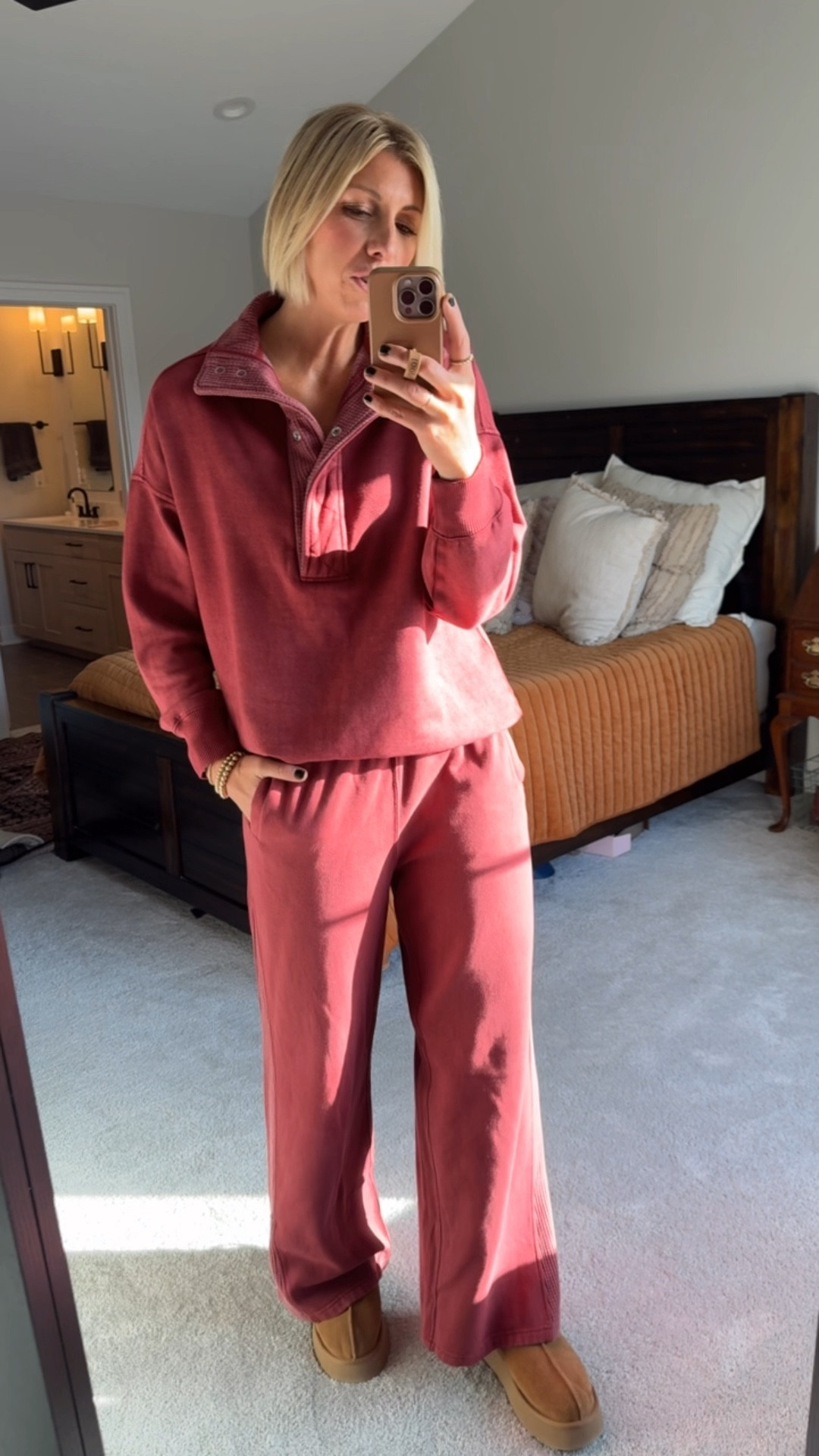Give me all the burgundy! Loving this super chic, matching sweatsuit perfect for a cozy day at home or travel day or day of errands. The top runs very oversized. I’m wearing an extra small and my true size medium in the bottoms.

#LTKActive #LTKOver40 #LTKFindsUnder100