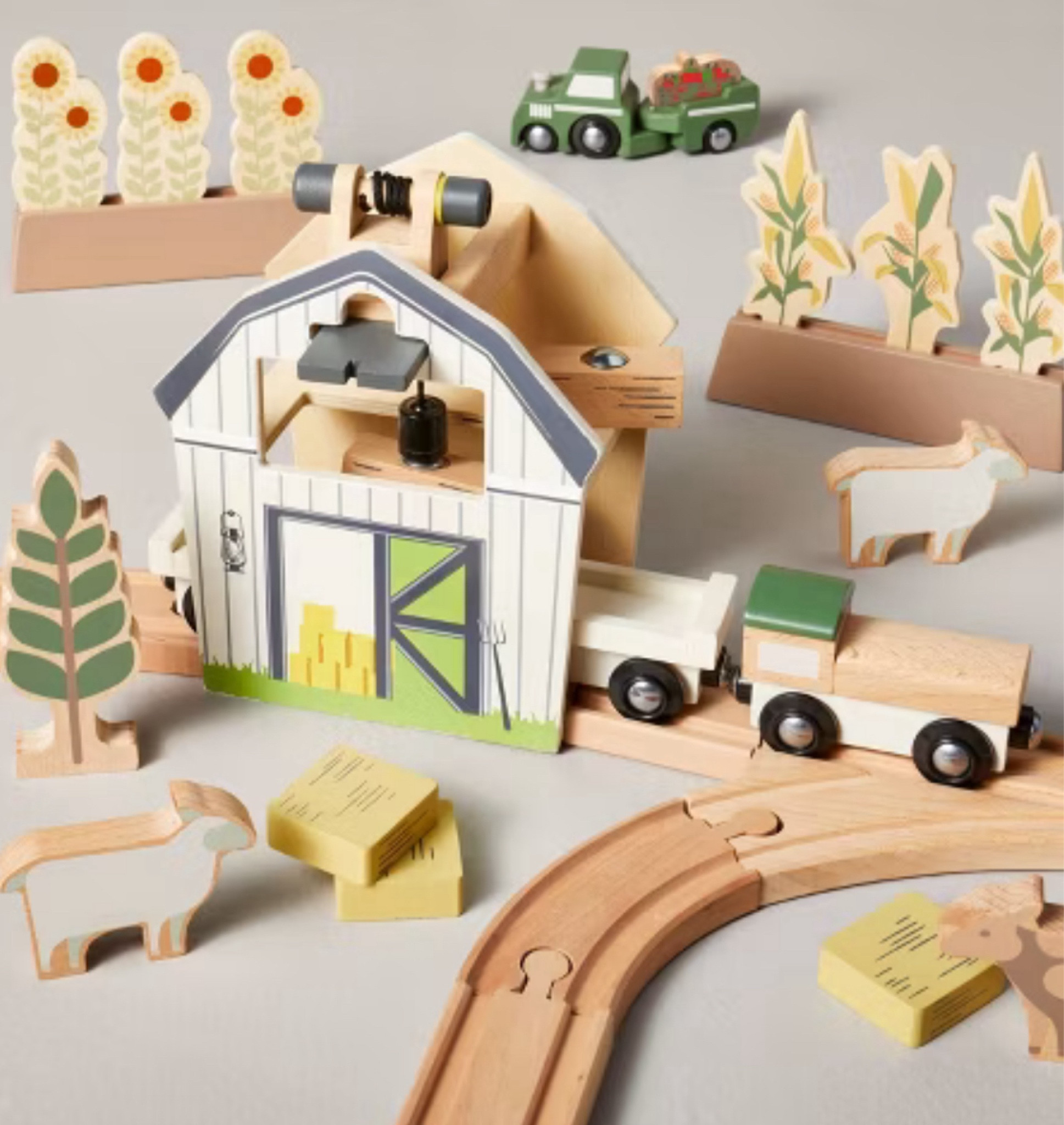 Your kid will be ready to board a train to a station of their own imagination with this 84-Piece Toy Train Track Set from Hearth & Hand™ with Magnolia. This toy set includes a track, trains, bridge, trees, windmill, cars, figurines, buildings and more to encourage imaginative play. Crafted from wood and metal, this toy train track set will provide hours of fun as your child learns and grows.

#LTKFamily #LTKKids #LTKBump