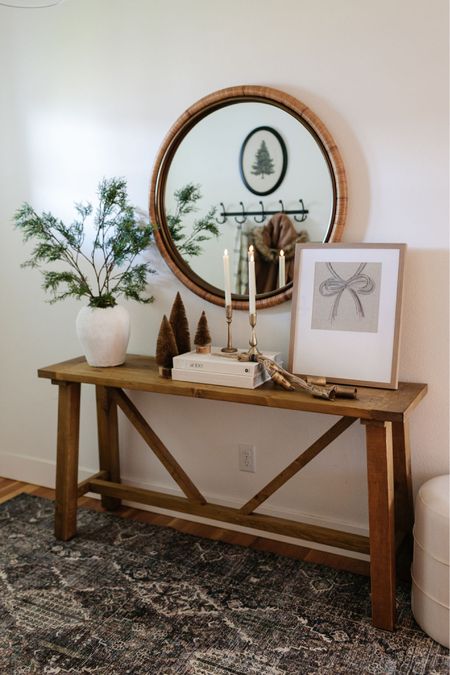 Christmas decor perfect for an entryway!  My rug is machine washable and affordable!
Console table decor

#LTKhome #LTKfindsunder100 #LTKHoliday