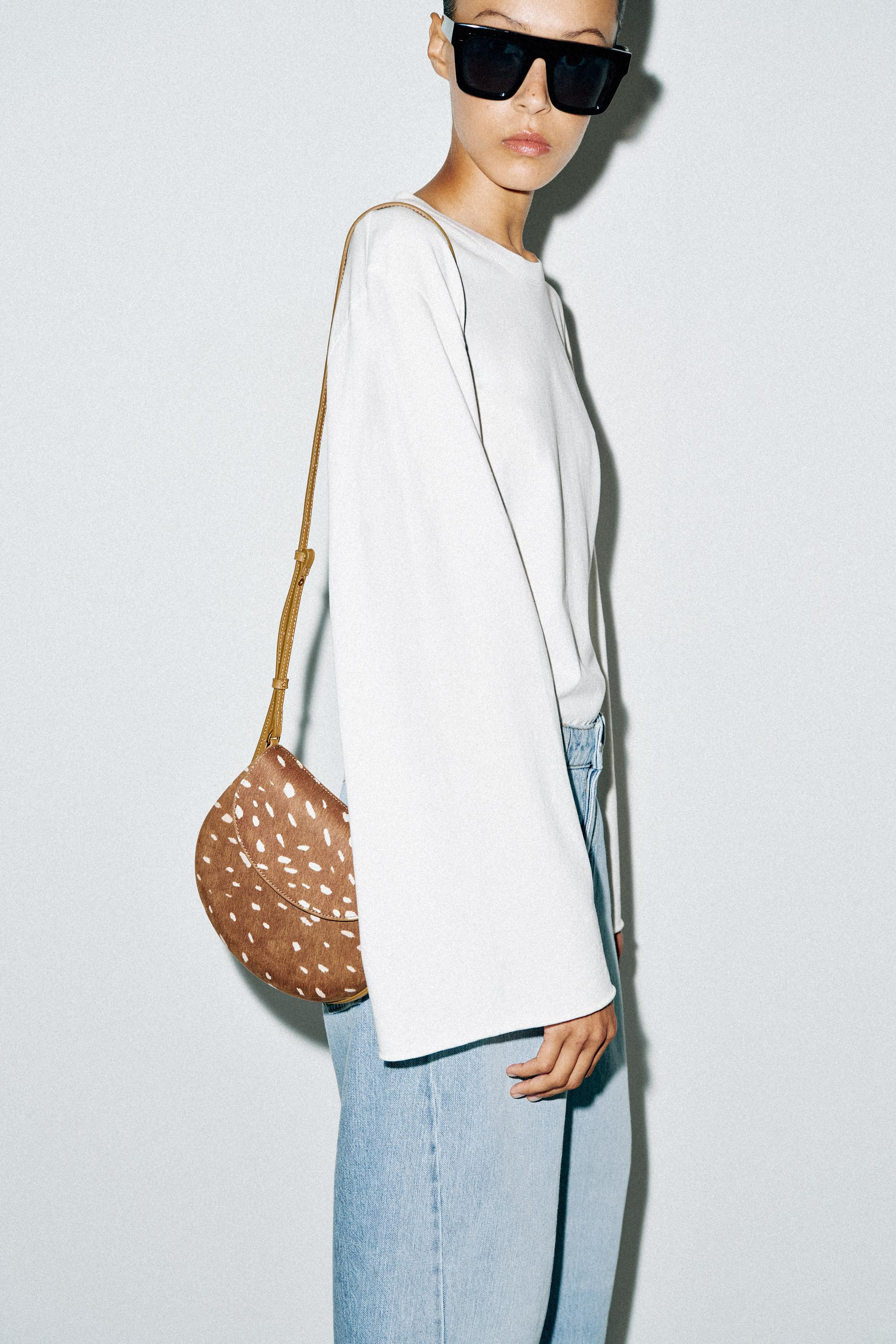 Crossbody bag. Animal print body. Interior zip pocket. Contrasting topstitching. Crossbody strap.... | Zara US